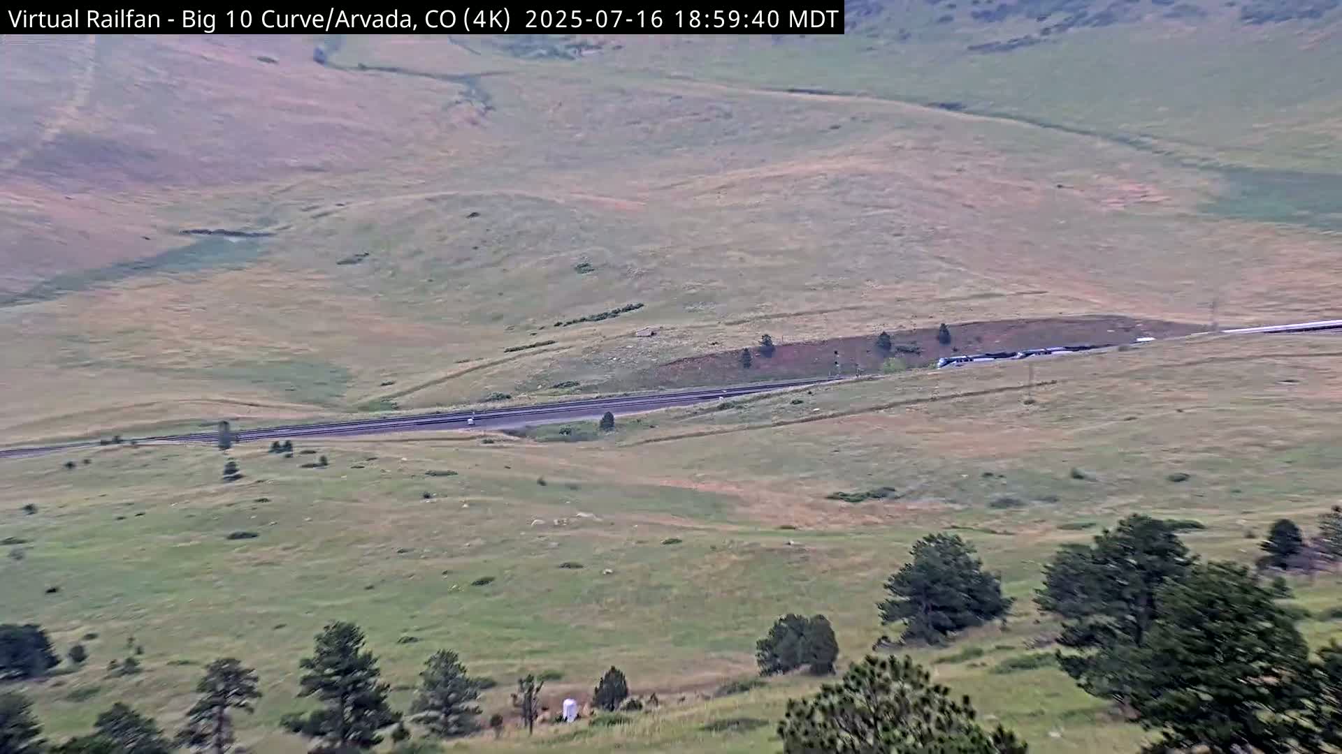 Denver Skyline  & Arvada Big  10 Curve Railroad Live Cam - Arvada, Jefferson, Colorado, USA