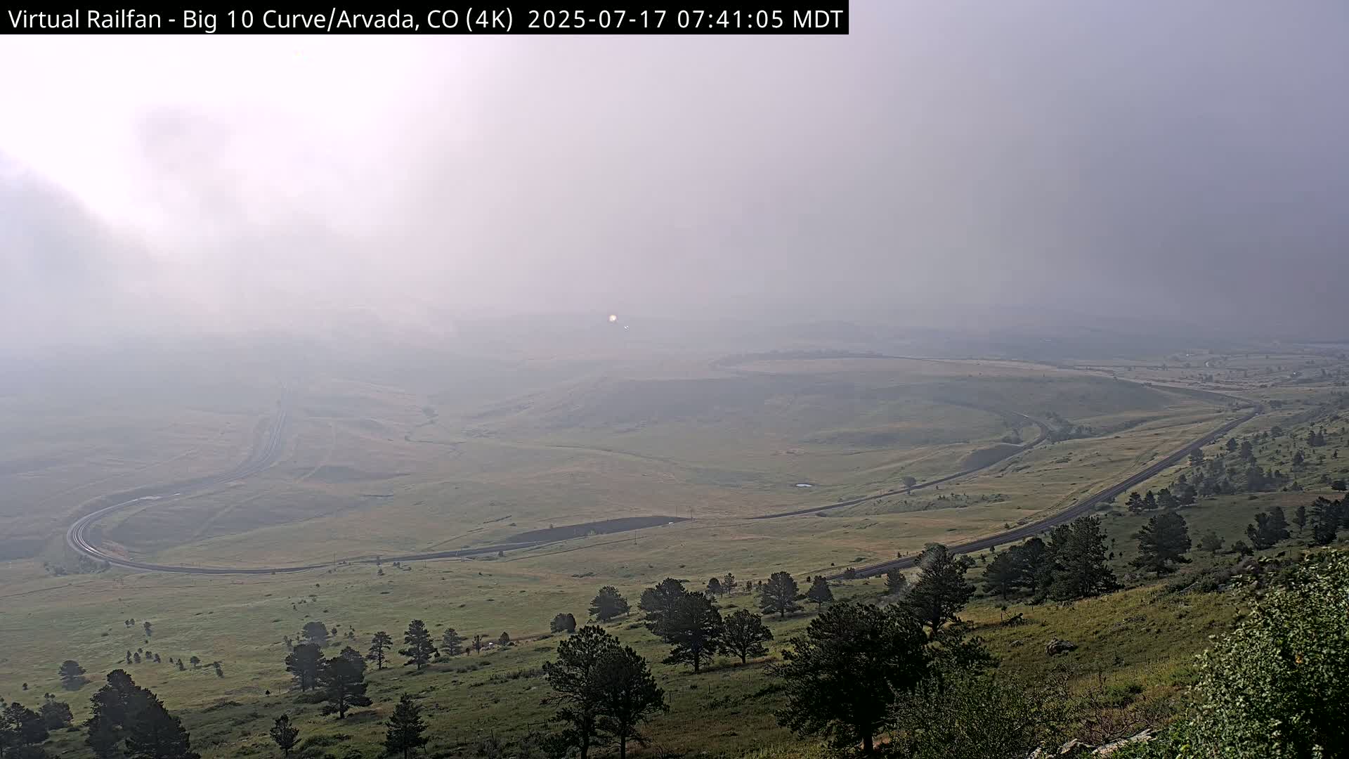 Denver Skyline  & Arvada Big  10 Curve Railroad Live Cam - Arvada, Jefferson, Colorado, USA