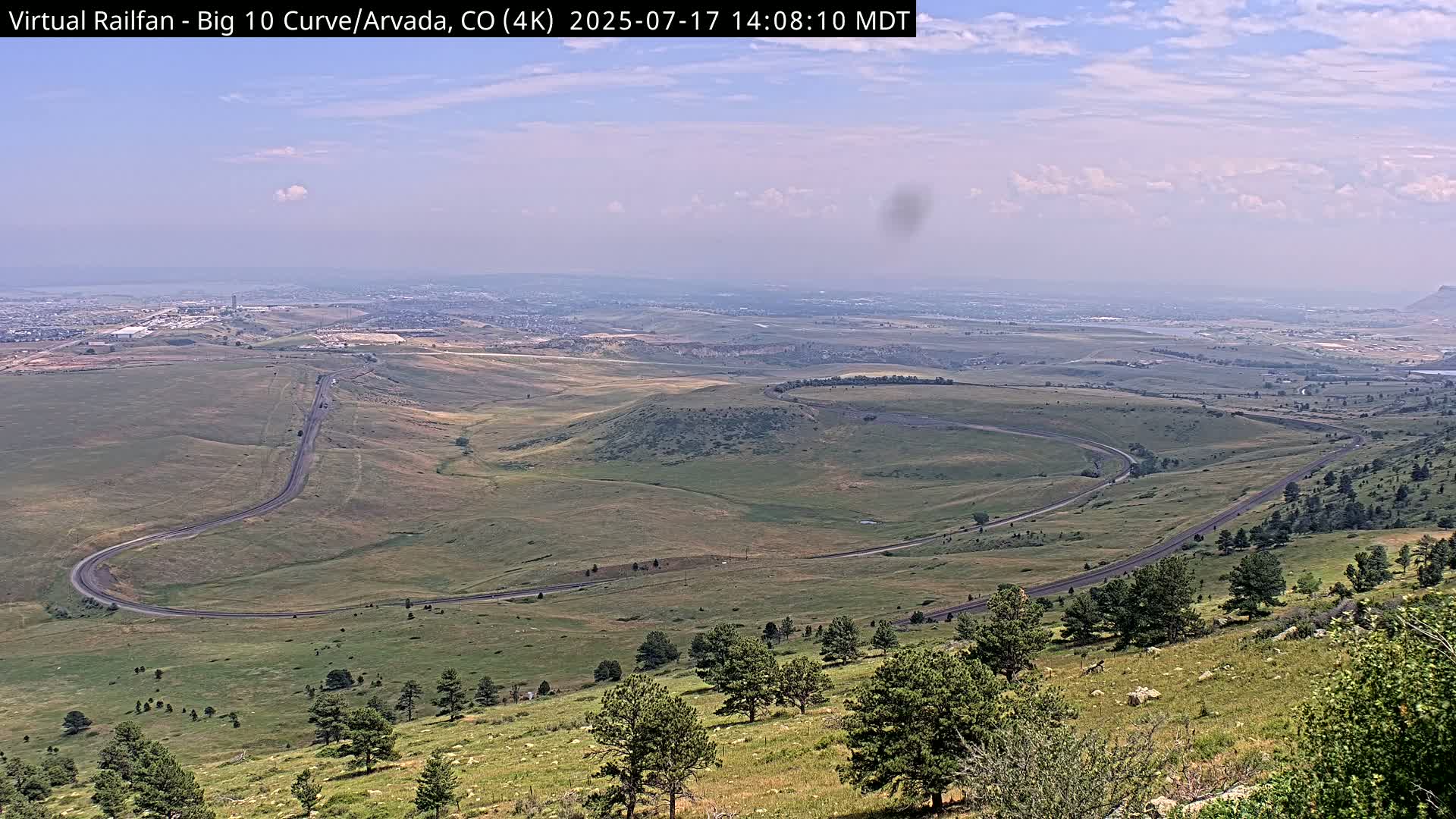 Denver Skyline  & Arvada Big  10 Curve Railroad Live Cam - Arvada, Jefferson, Colorado, USA