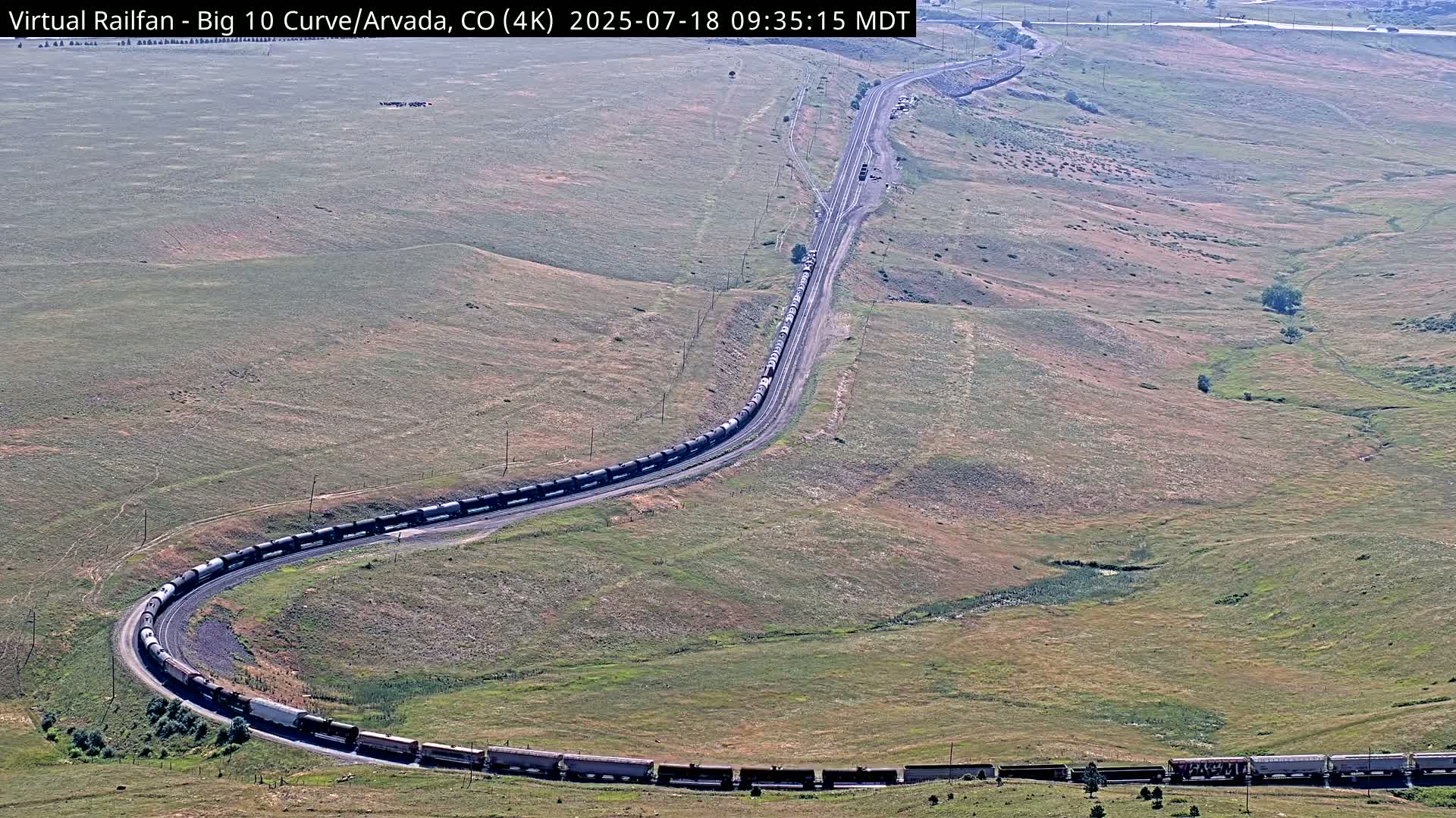 Denver Skyline  & Arvada Big  10 Curve Railroad Live Cam - Arvada, Jefferson, Colorado, USA