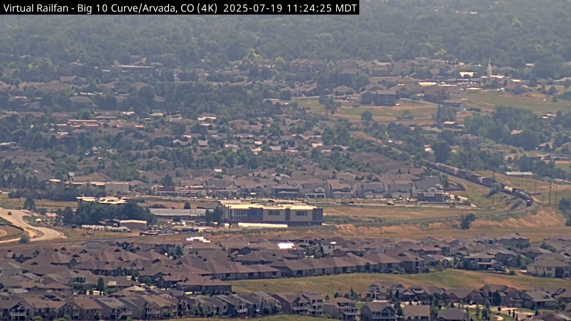 Denver Skyline  & Arvada Big  10 Curve Railroad Live Cam - Arvada, Jefferson, Colorado, USA