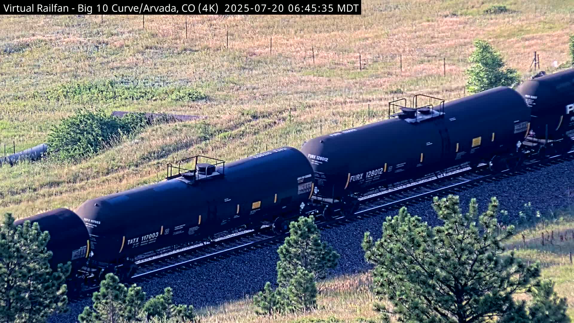 Denver Skyline  & Arvada Big  10 Curve Railroad Live Cam - Arvada, Jefferson, Colorado, USA