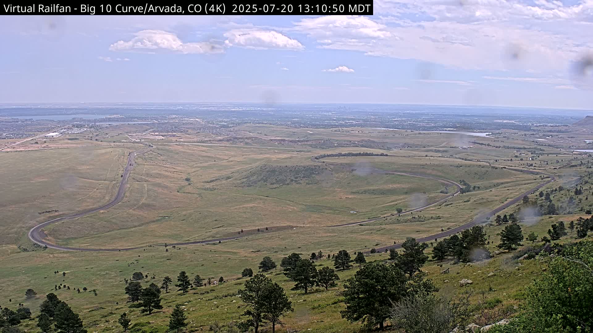 Denver Skyline  & Arvada Big  10 Curve Railroad Live Cam - Arvada, Jefferson, Colorado, USA