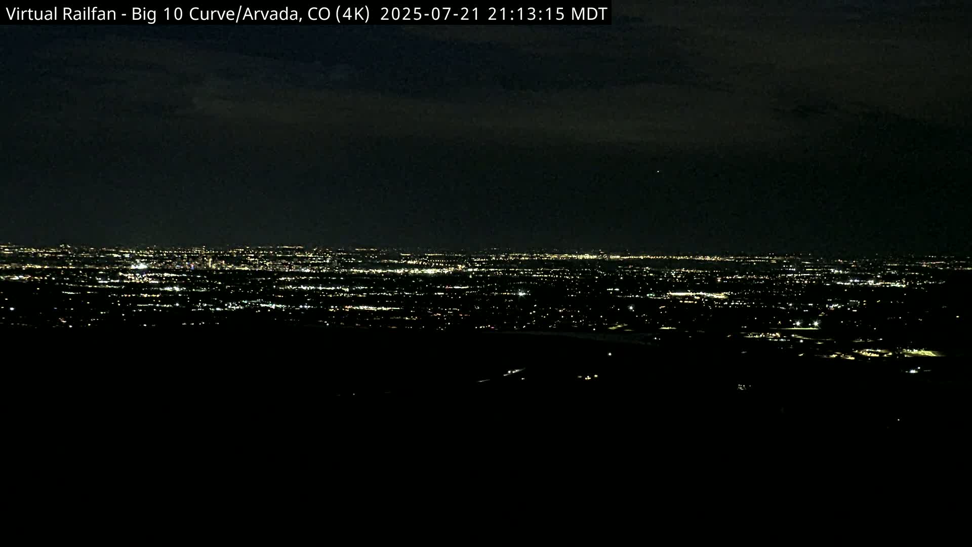 Denver Skyline  & Arvada Big  10 Curve Railroad Live Cam - Arvada, Jefferson, Colorado, USA