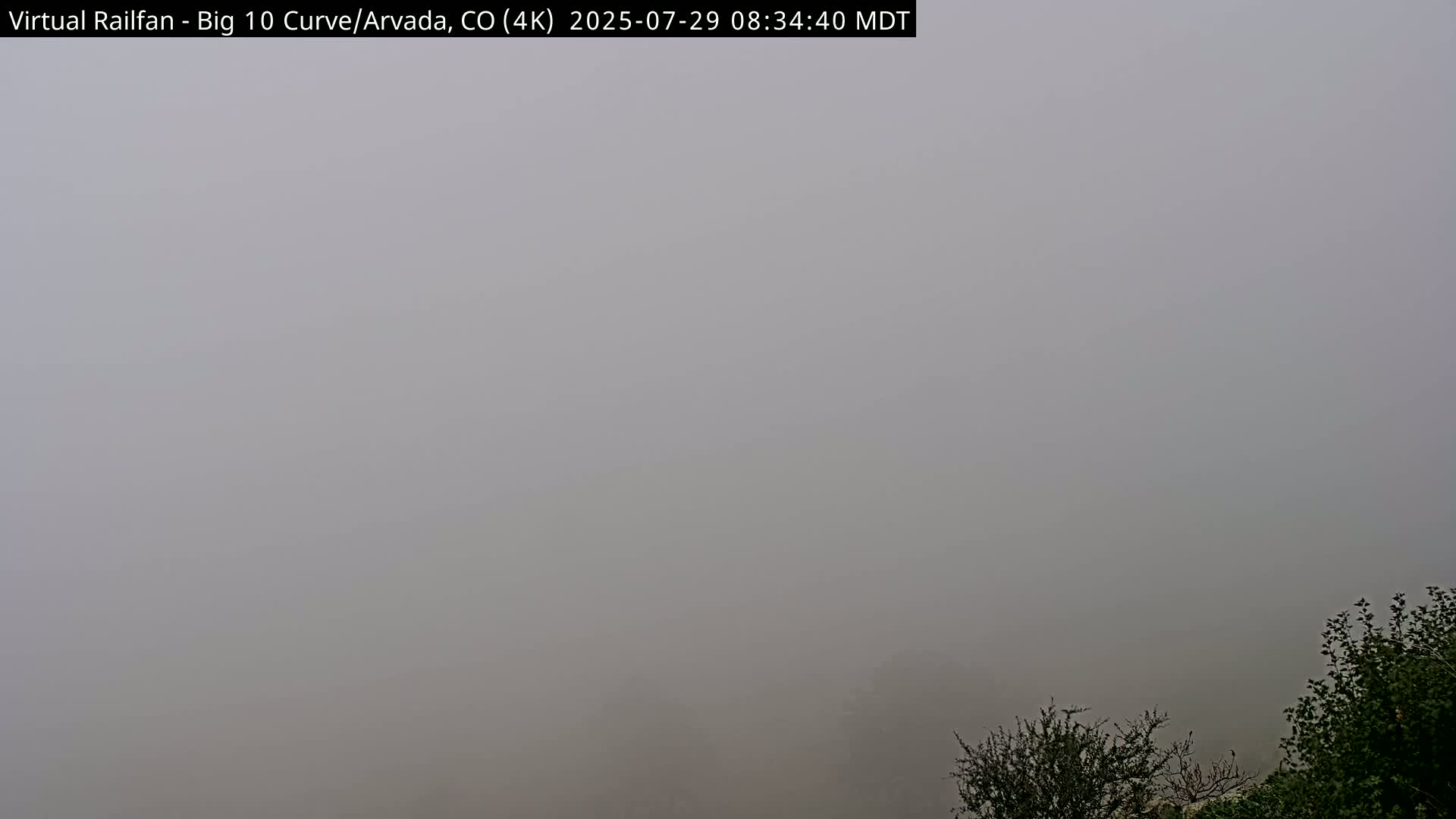Denver Skyline  & Arvada Big  10 Curve Railroad Live Cam - Arvada, Jefferson, Colorado, USA