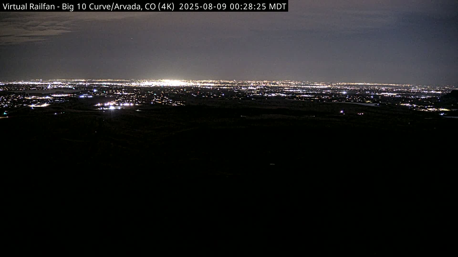 Denver Skyline  & Arvada Big  10 Curve Railroad Live Cam - Arvada, Jefferson, Colorado, USA