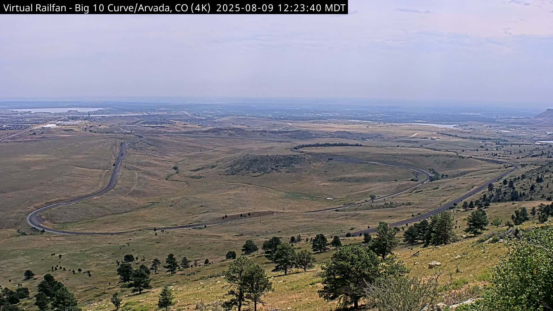Denver Skyline  & Arvada Big  10 Curve Railroad Live Cam - Arvada, Jefferson, Colorado, USA