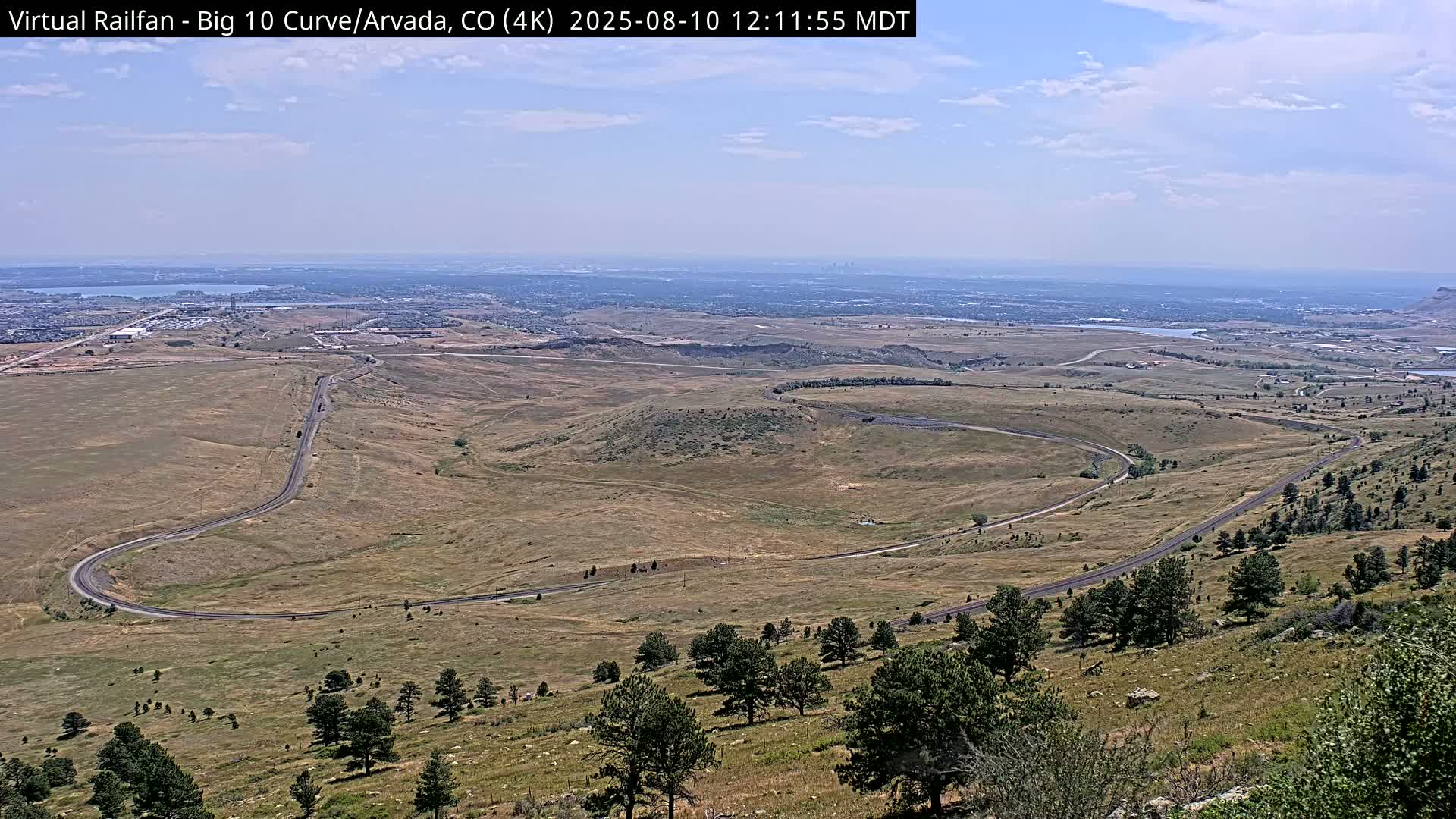 Denver Skyline  & Arvada Big  10 Curve Railroad Live Cam - Arvada, Jefferson, Colorado, USA