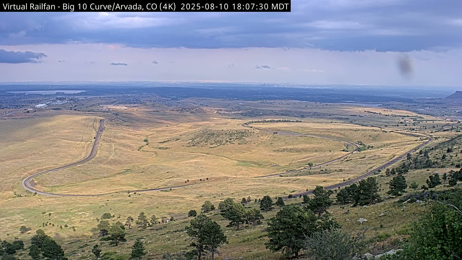 Denver Skyline  & Arvada Big  10 Curve Railroad Live Cam - Arvada, Jefferson, Colorado, USA