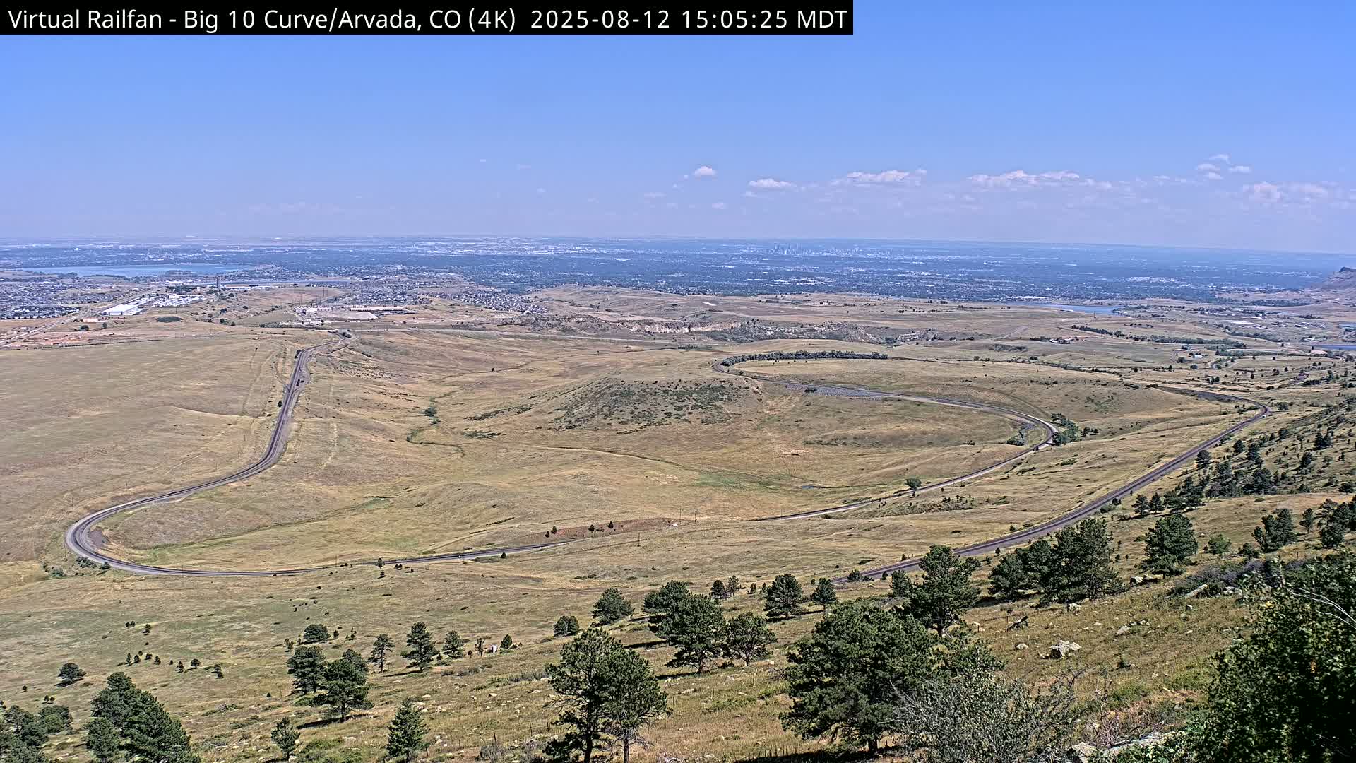Denver Skyline  & Arvada Big  10 Curve Railroad Live Cam - Arvada, Jefferson, Colorado, USA