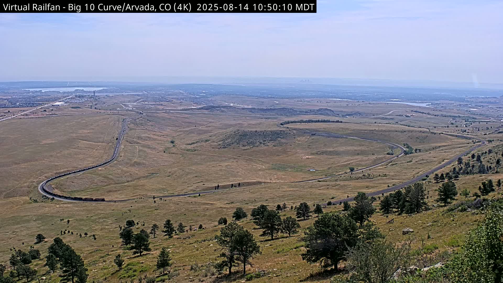 Denver Skyline  & Arvada Big  10 Curve Railroad Live Cam - Arvada, Jefferson, Colorado, USA