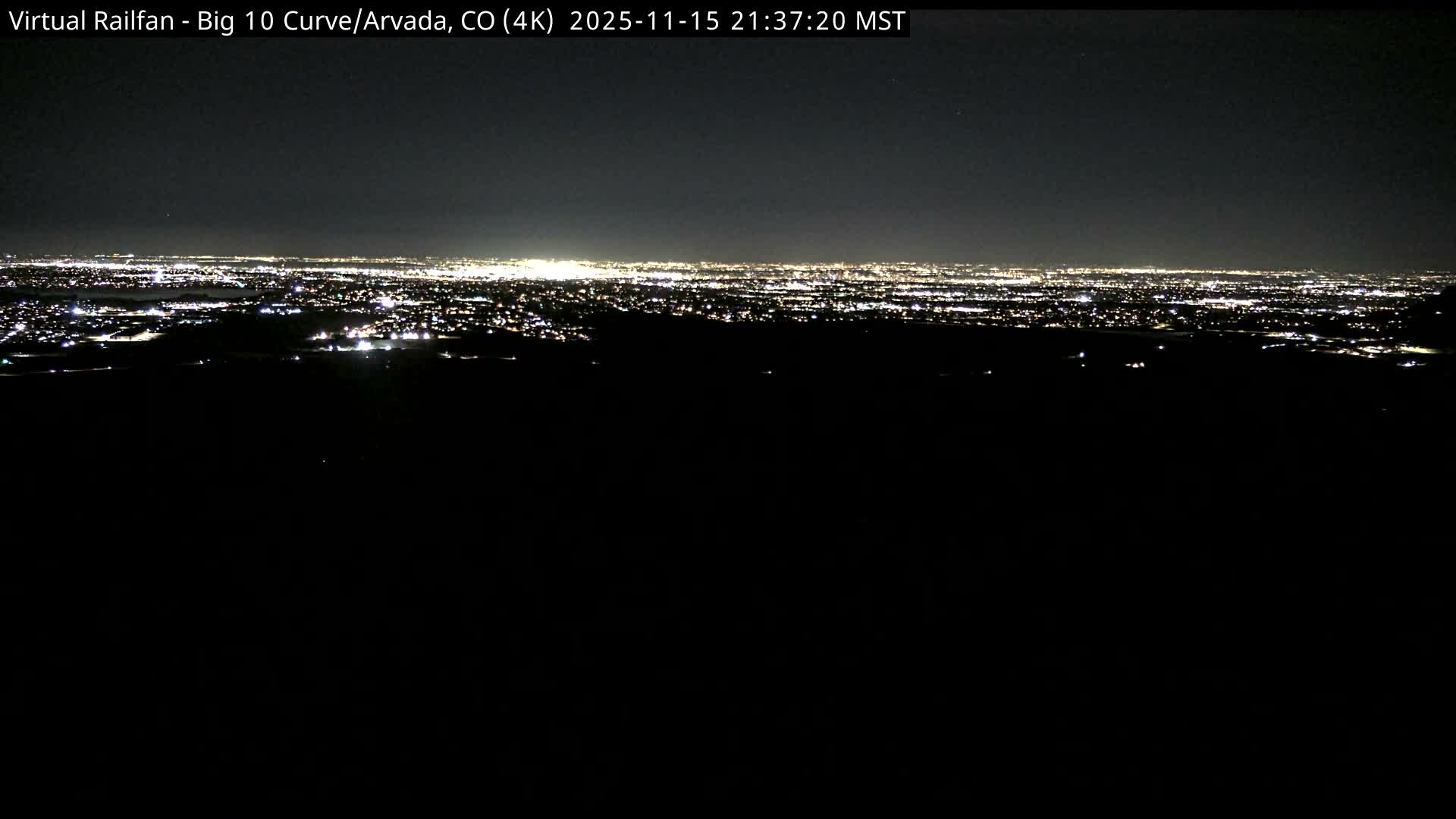 Denver Skyline  & Arvada Big  10 Curve Railroad Live Cam - Arvada, Jefferson, Colorado, USA