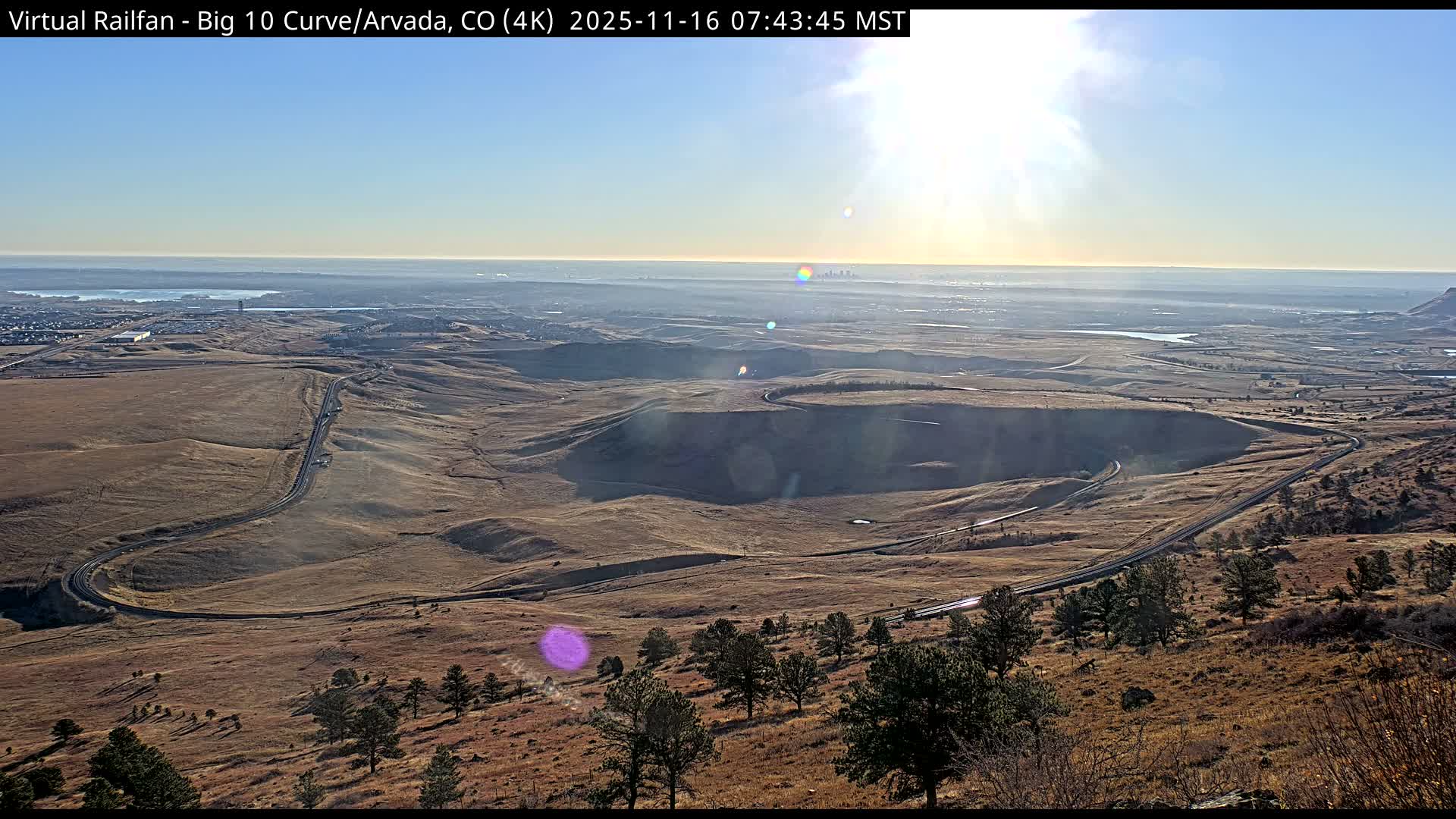 Denver Skyline  & Arvada Big  10 Curve Railroad Live Cam - Arvada, Jefferson, Colorado, USA