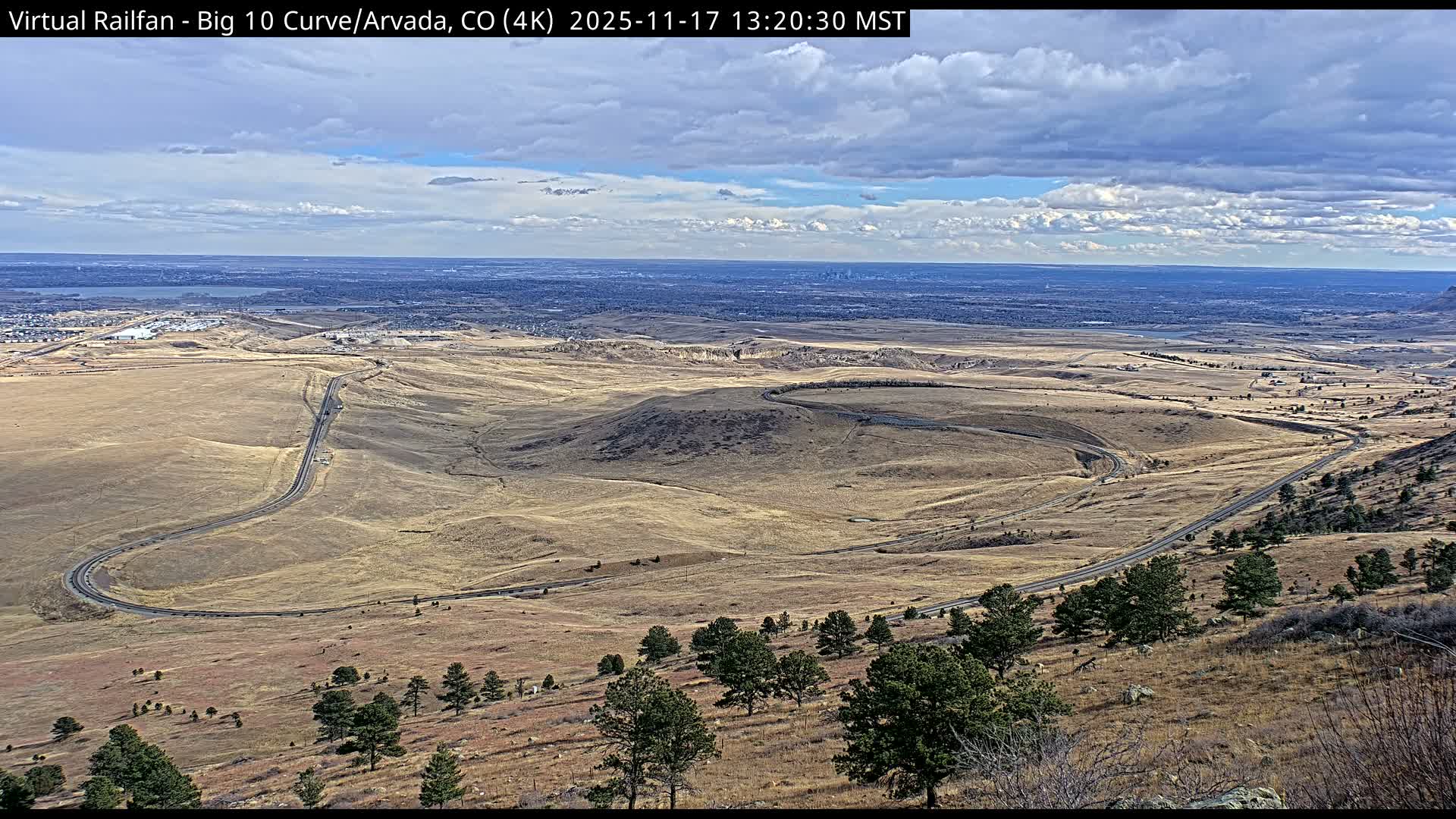 Denver Skyline  & Arvada Big  10 Curve Railroad Live Cam - Arvada, Jefferson, Colorado, USA