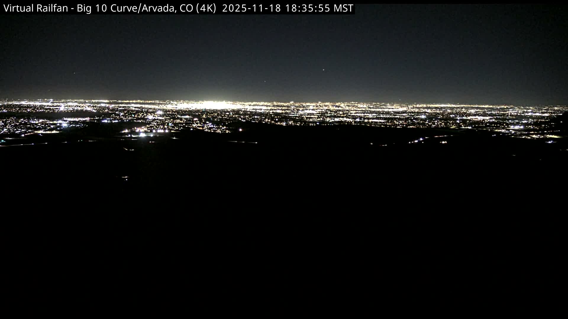 Denver Skyline  & Arvada Big  10 Curve Railroad Live Cam - Arvada, Jefferson, Colorado, USA