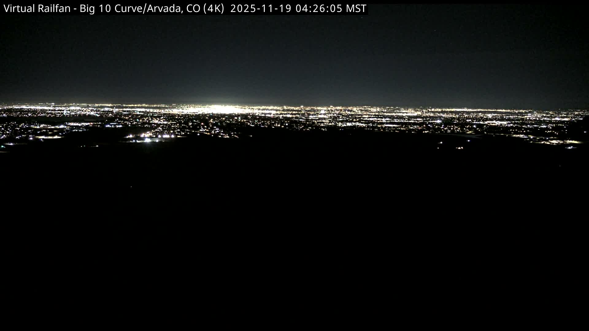 Denver Skyline  & Arvada Big  10 Curve Railroad Live Cam - Arvada, Jefferson, Colorado, USA