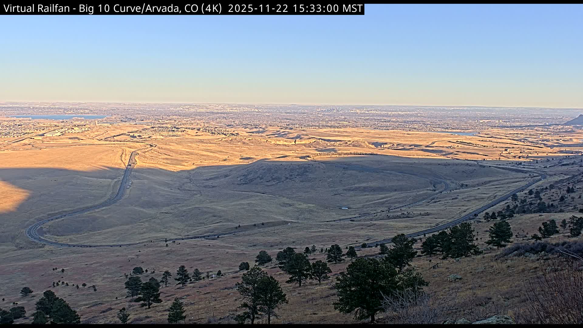 Denver Skyline  & Arvada Big  10 Curve Railroad Live Cam - Arvada, Jefferson, Colorado, USA
