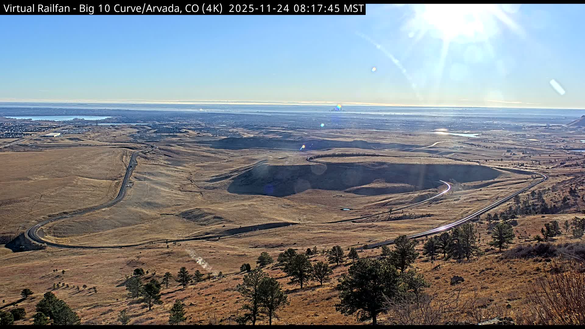 Denver Skyline  & Arvada Big  10 Curve Railroad Live Cam - Arvada, Jefferson, Colorado, USA