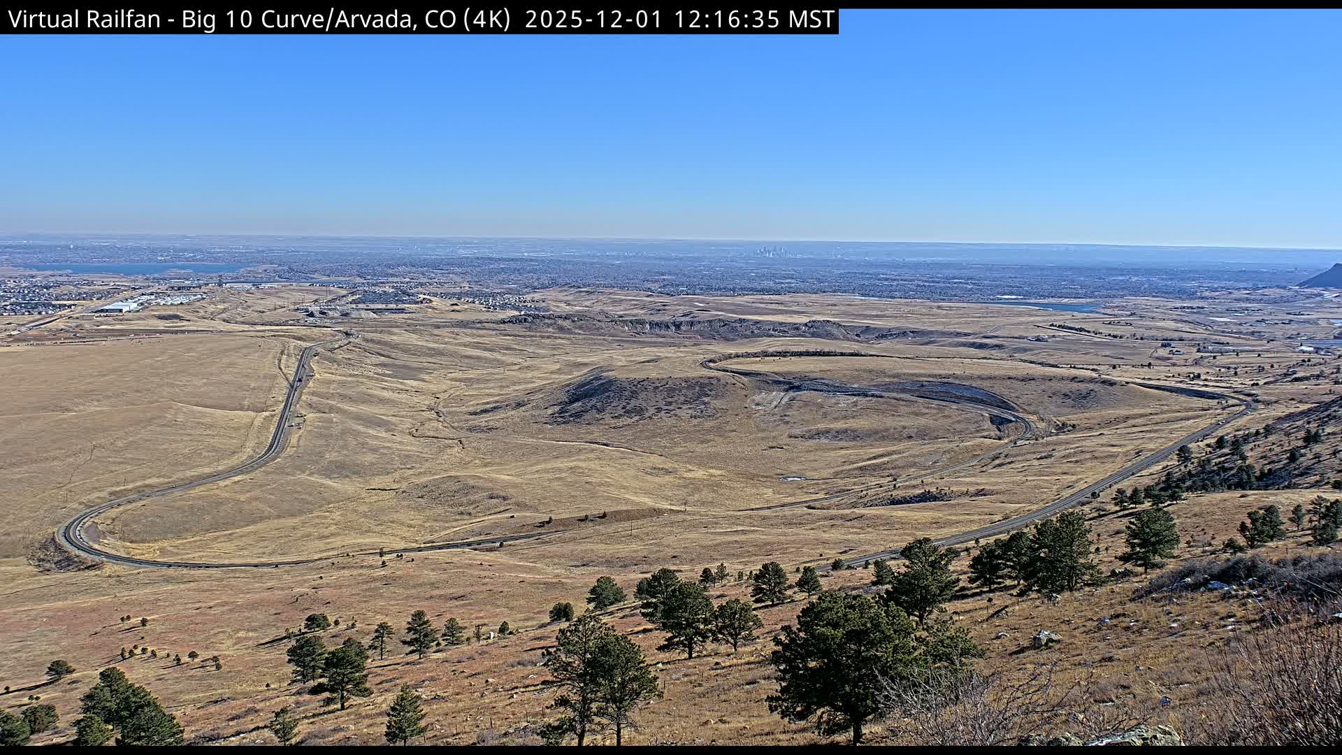 Denver Skyline  & Arvada Big  10 Curve Railroad Live Cam - Arvada, Jefferson, Colorado, USA