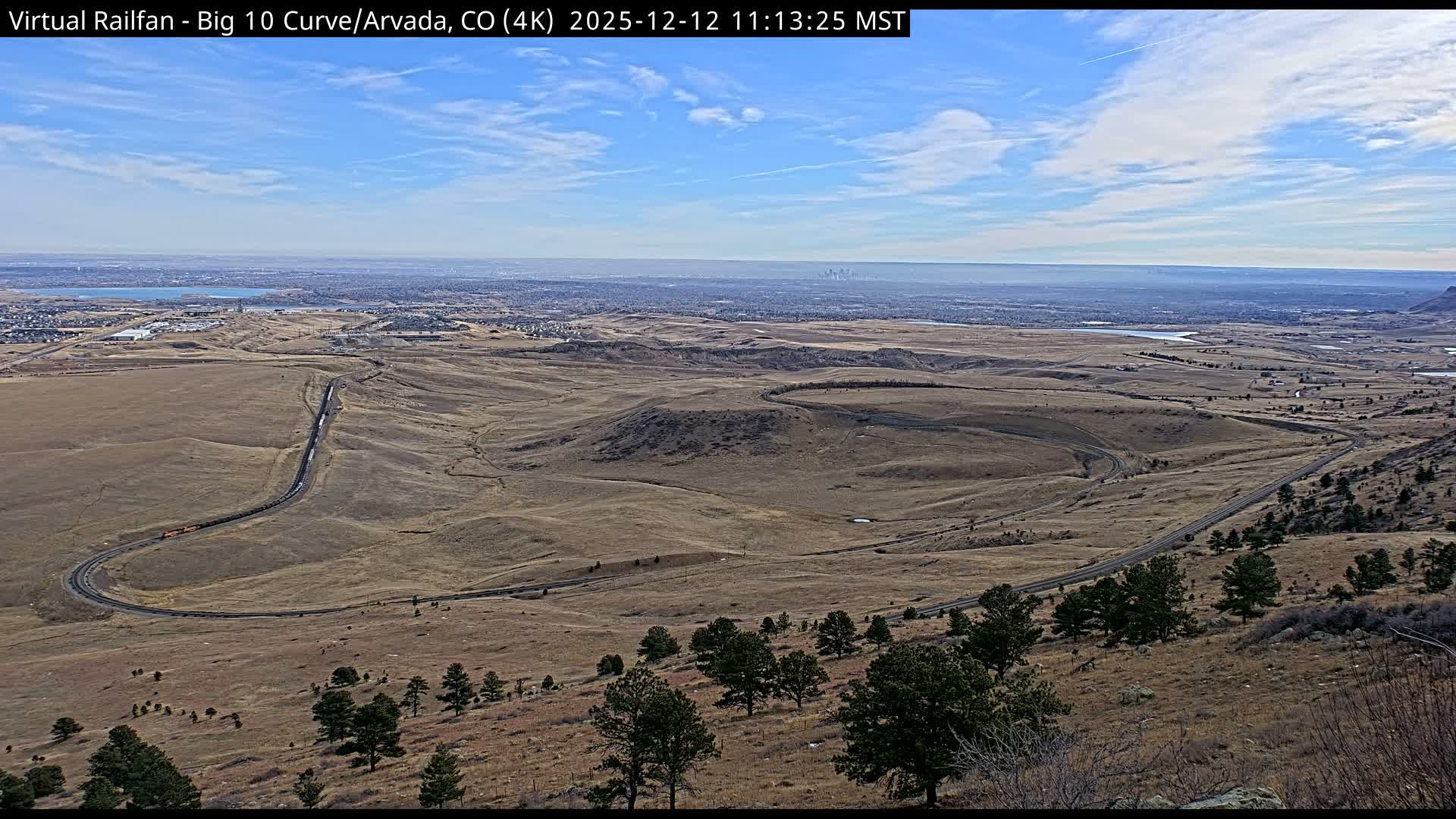 Denver Skyline  & Arvada Big  10 Curve Railroad Live Cam - Arvada, Jefferson, Colorado, USA
