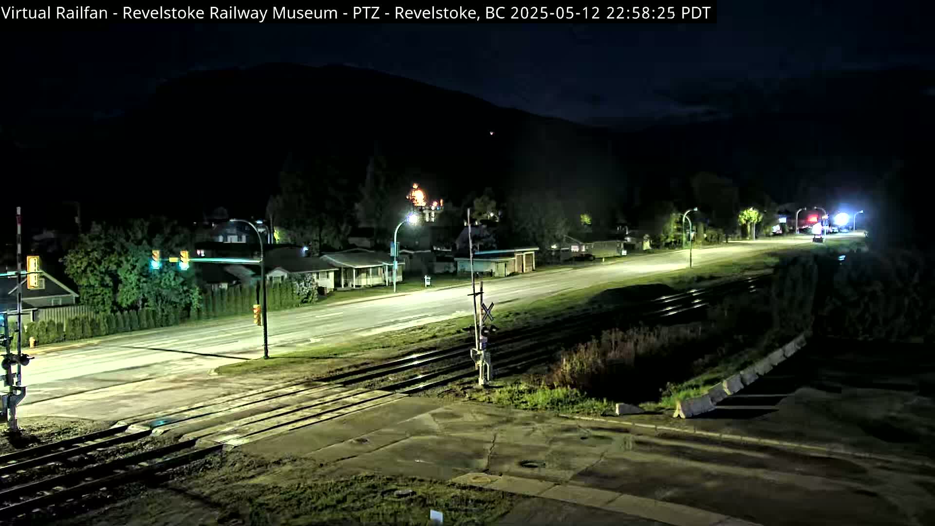 Revelstoke City & Canadian Pacific Railway Railroad Crossing Live Cam - Revelstoke, Columbia-Shuswap, British Columbia, Canada  PTZ | Virtual Railfan LIVE ! 2025-03-18 12:14