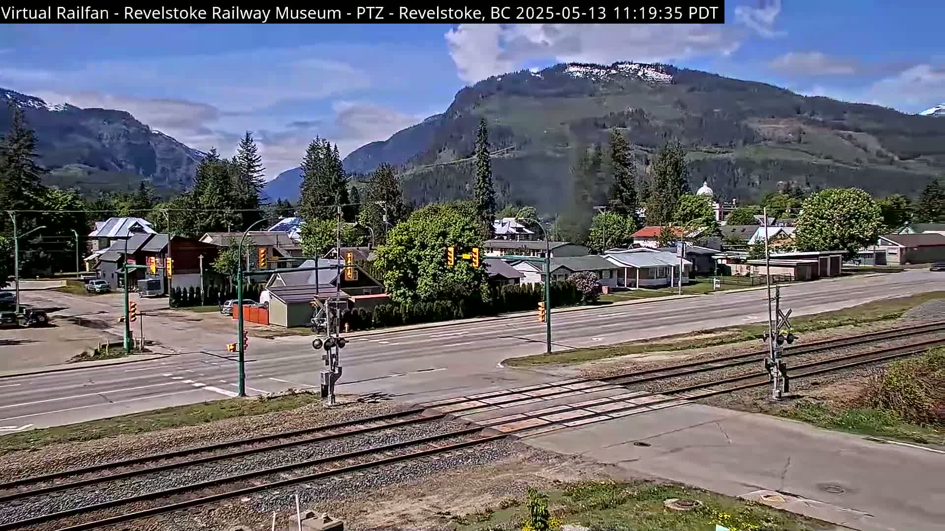 Revelstoke City & Canadian Pacific Railway Railroad Crossing Live Cam - Revelstoke, Columbia-Shuswap, British Columbia, Canada  PTZ | Virtual Railfan LIVE ! 2025-03-18 12:14