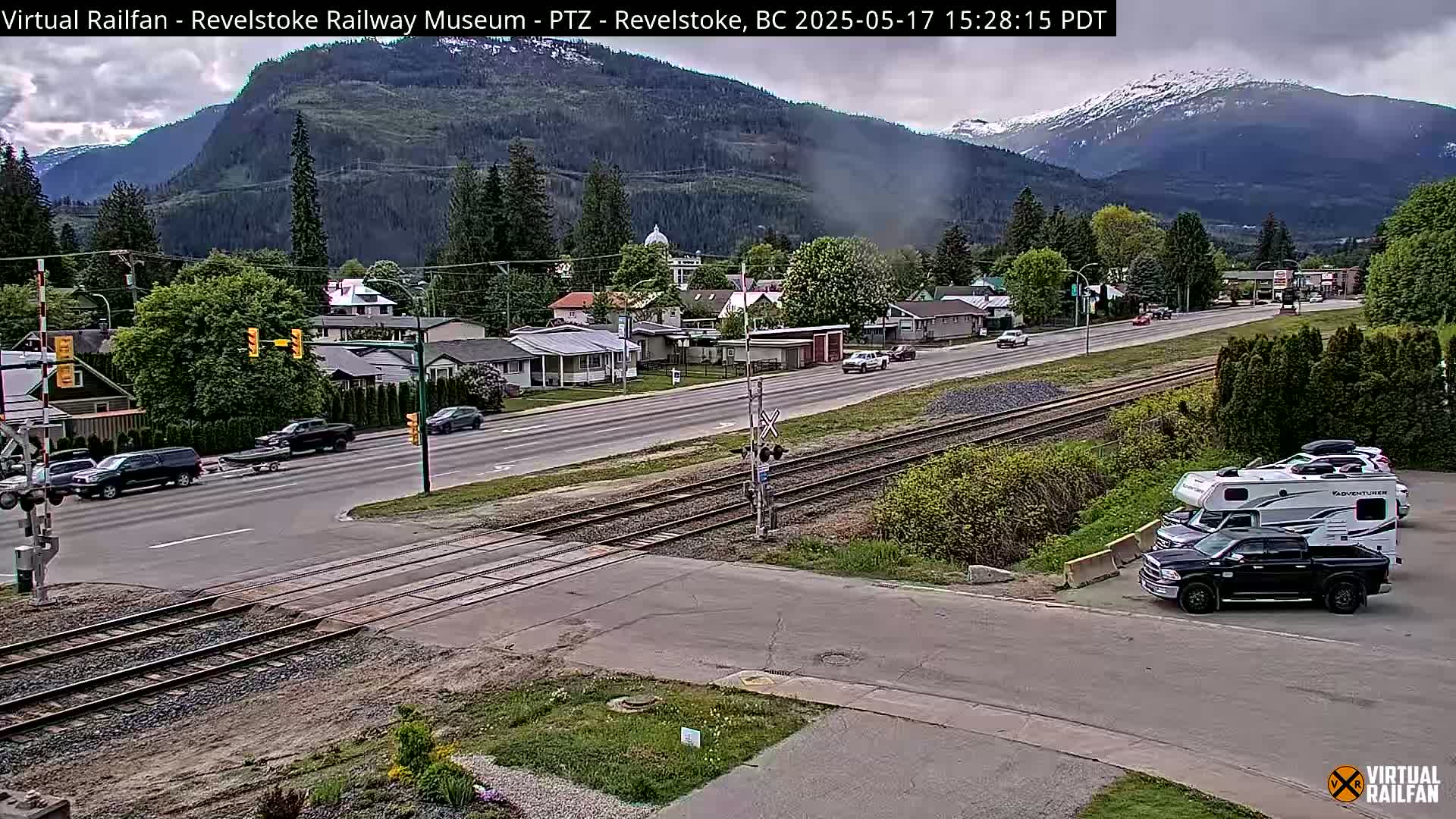 Revelstoke City & Canadian Pacific Railway Railroad Crossing Live Cam - Revelstoke, Columbia-Shuswap, British Columbia, Canada  PTZ | Virtual Railfan LIVE ! 2025-03-18 12:14
