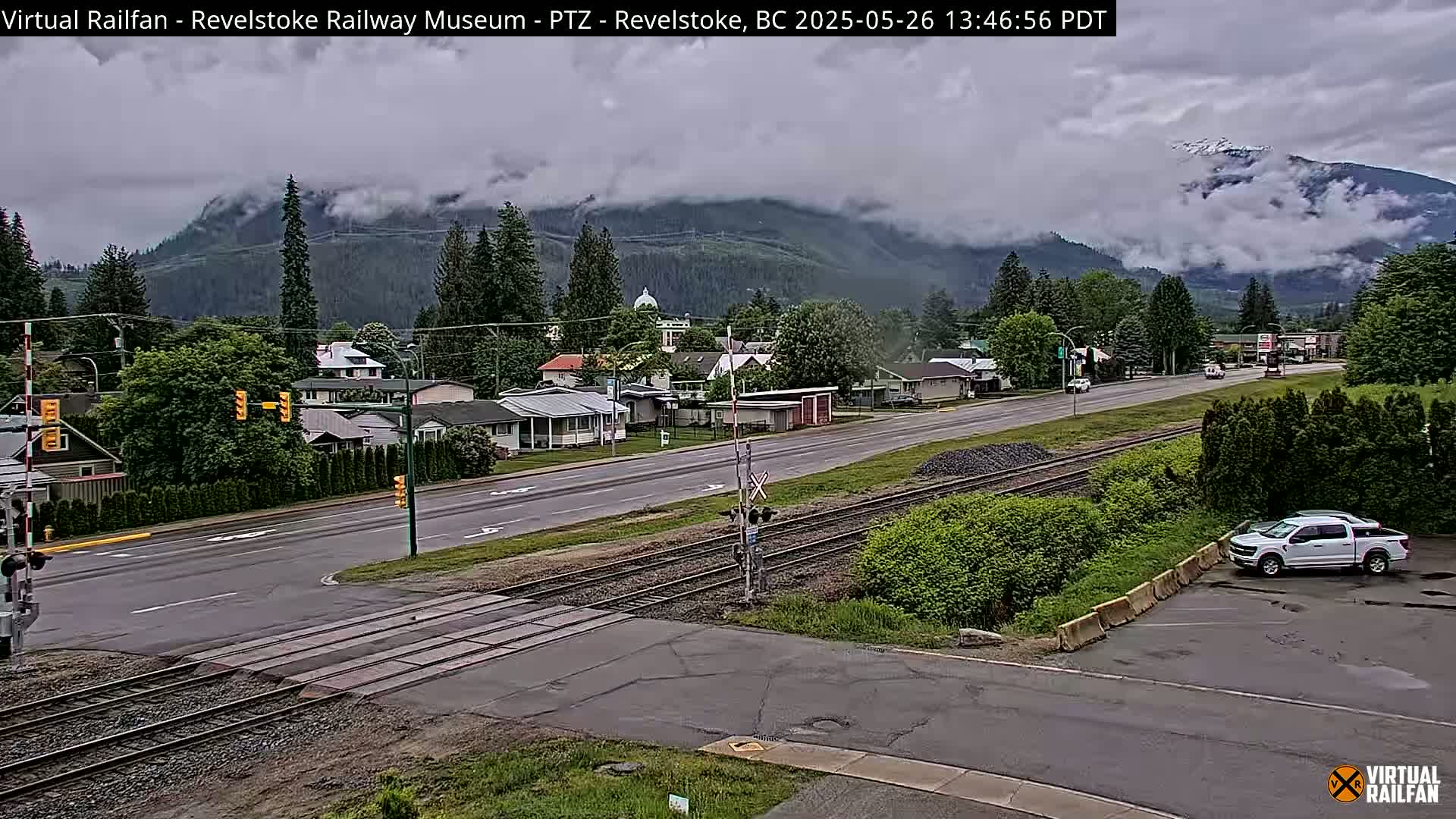 Revelstoke City & Canadian Pacific Railway Railroad Crossing Live Cam - Revelstoke, Columbia-Shuswap, British Columbia, Canada  PTZ | Virtual Railfan LIVE ! 2025-03-18 12:14