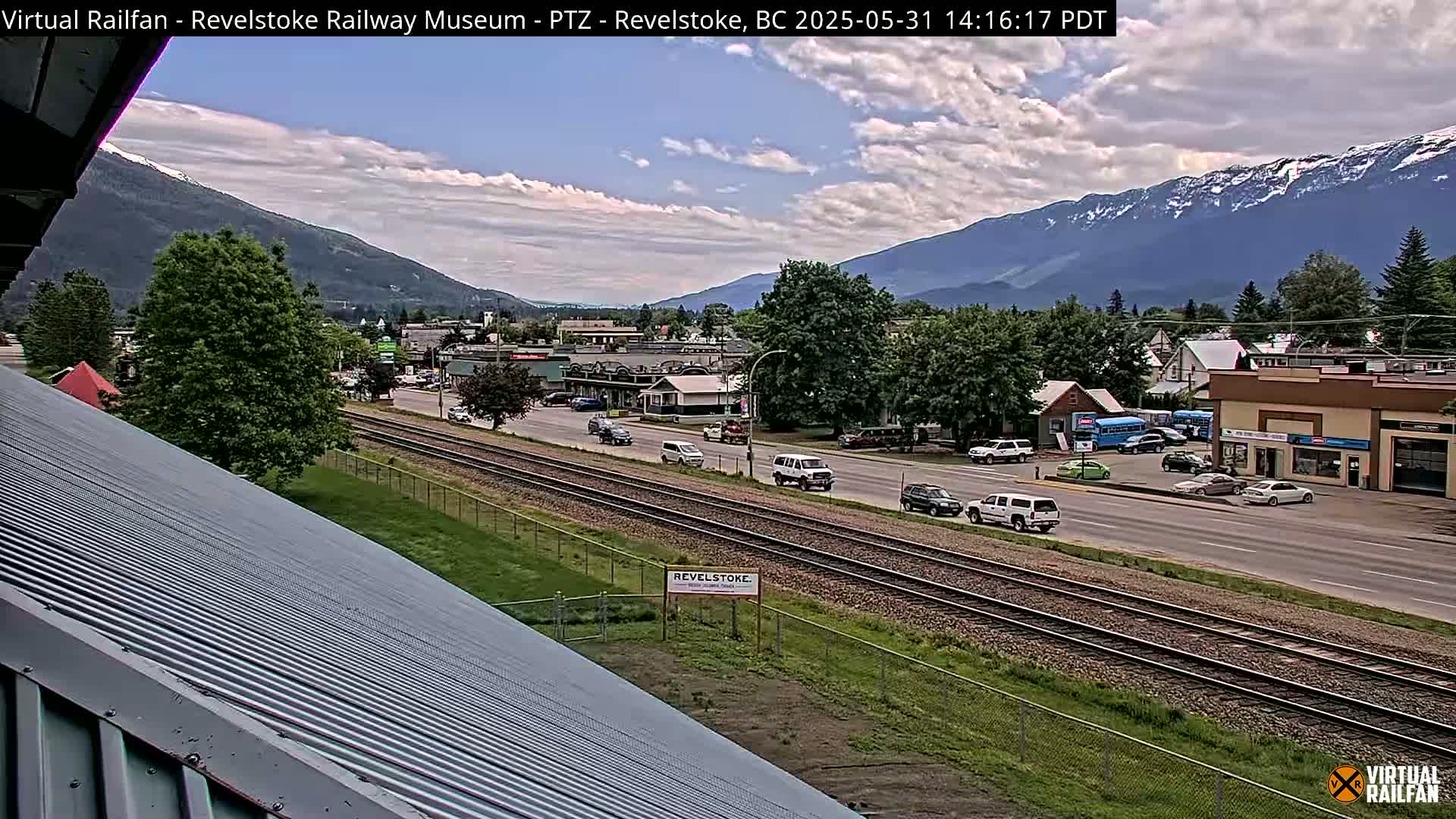 Revelstoke City & Canadian Pacific Railway Railroad Crossing Live Cam - Revelstoke, Columbia-Shuswap, British Columbia, Canada  PTZ | Virtual Railfan LIVE ! 2025-03-18 12:14