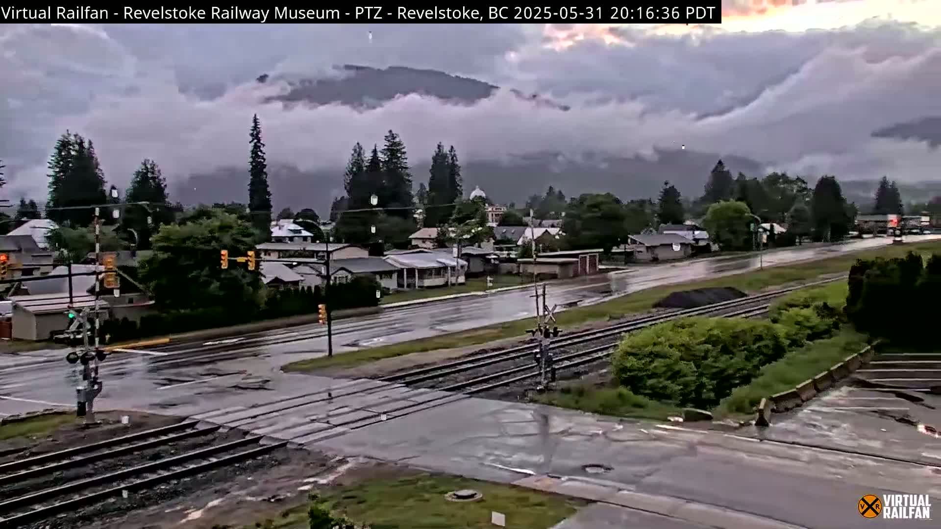 Revelstoke City & Canadian Pacific Railway Railroad Crossing Live Cam - Revelstoke, Columbia-Shuswap, British Columbia, Canada  PTZ | Virtual Railfan LIVE ! 2025-03-18 12:14