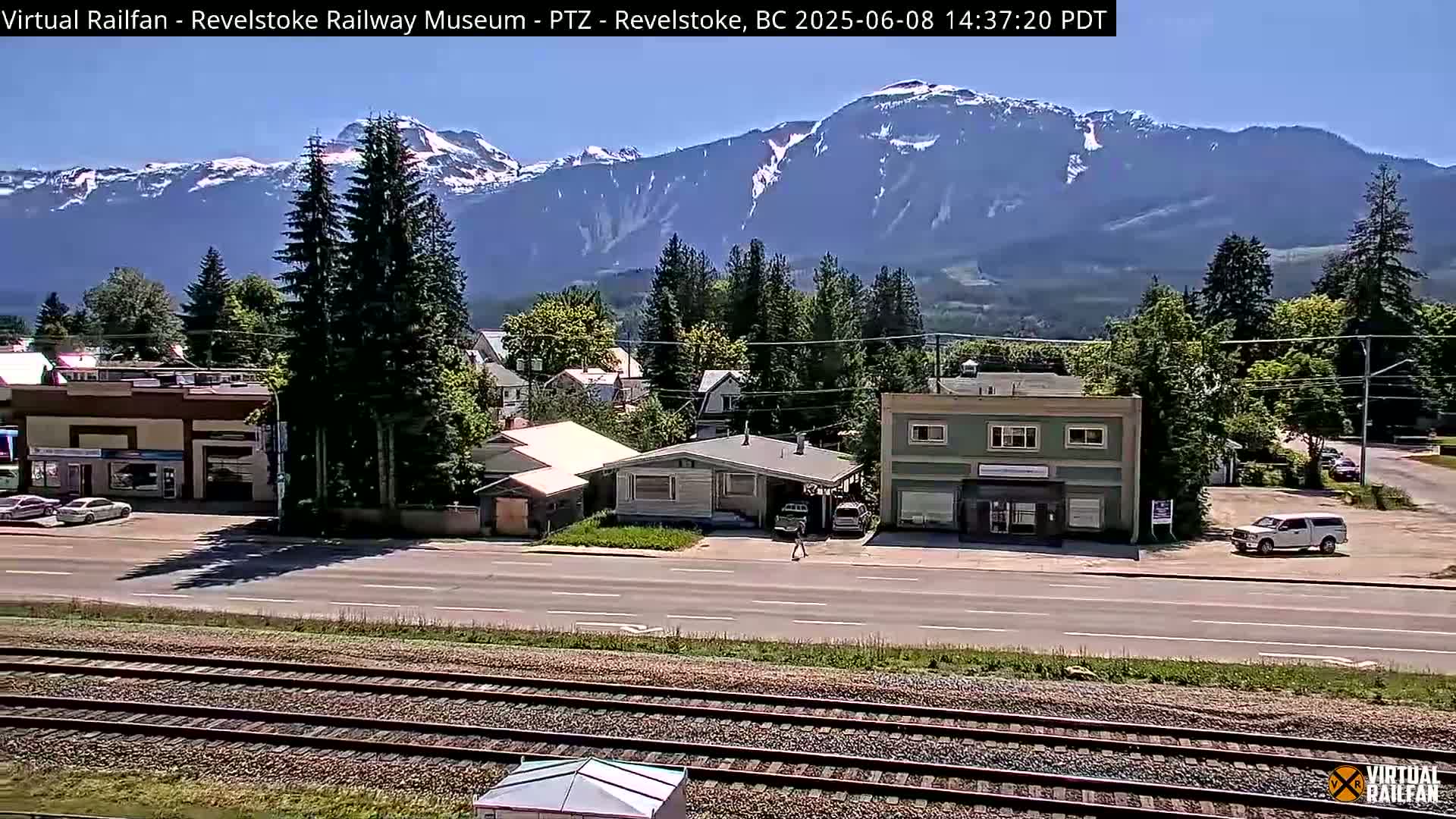 Revelstoke City & Canadian Pacific Railway Railroad Crossing Live Cam - Revelstoke, Columbia-Shuswap, British Columbia, Canada  PTZ | Virtual Railfan LIVE ! 2025-03-18 12:14
