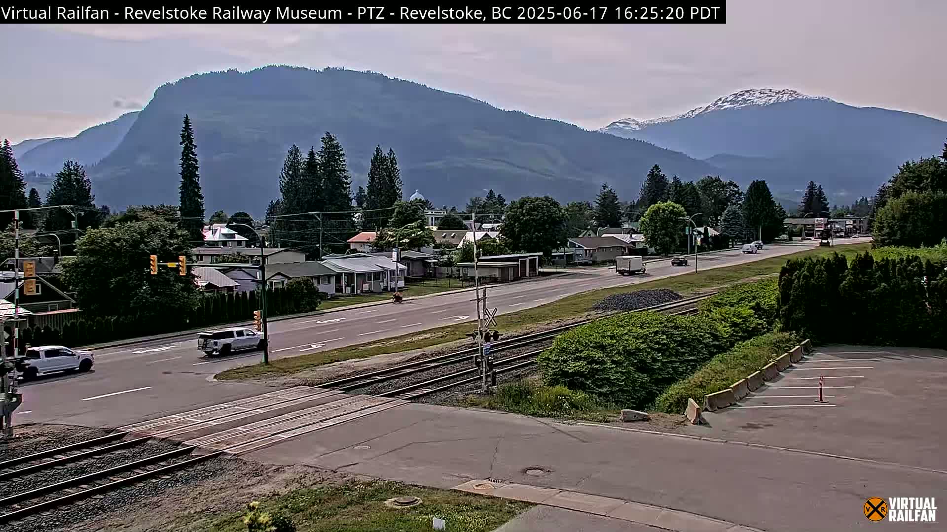 Revelstoke City & Canadian Pacific Railway Railroad Crossing Live Cam - Revelstoke, Columbia-Shuswap, British Columbia, Canada  PTZ | Virtual Railfan LIVE ! 2025-03-18 12:14