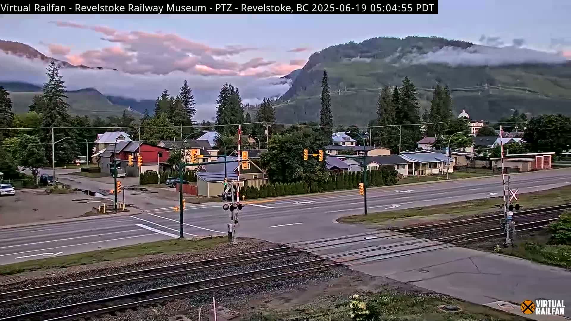 Revelstoke City & Canadian Pacific Railway Railroad Crossing Live Cam - Revelstoke, Columbia-Shuswap, British Columbia, Canada  PTZ | Virtual Railfan LIVE ! 2025-03-18 12:14