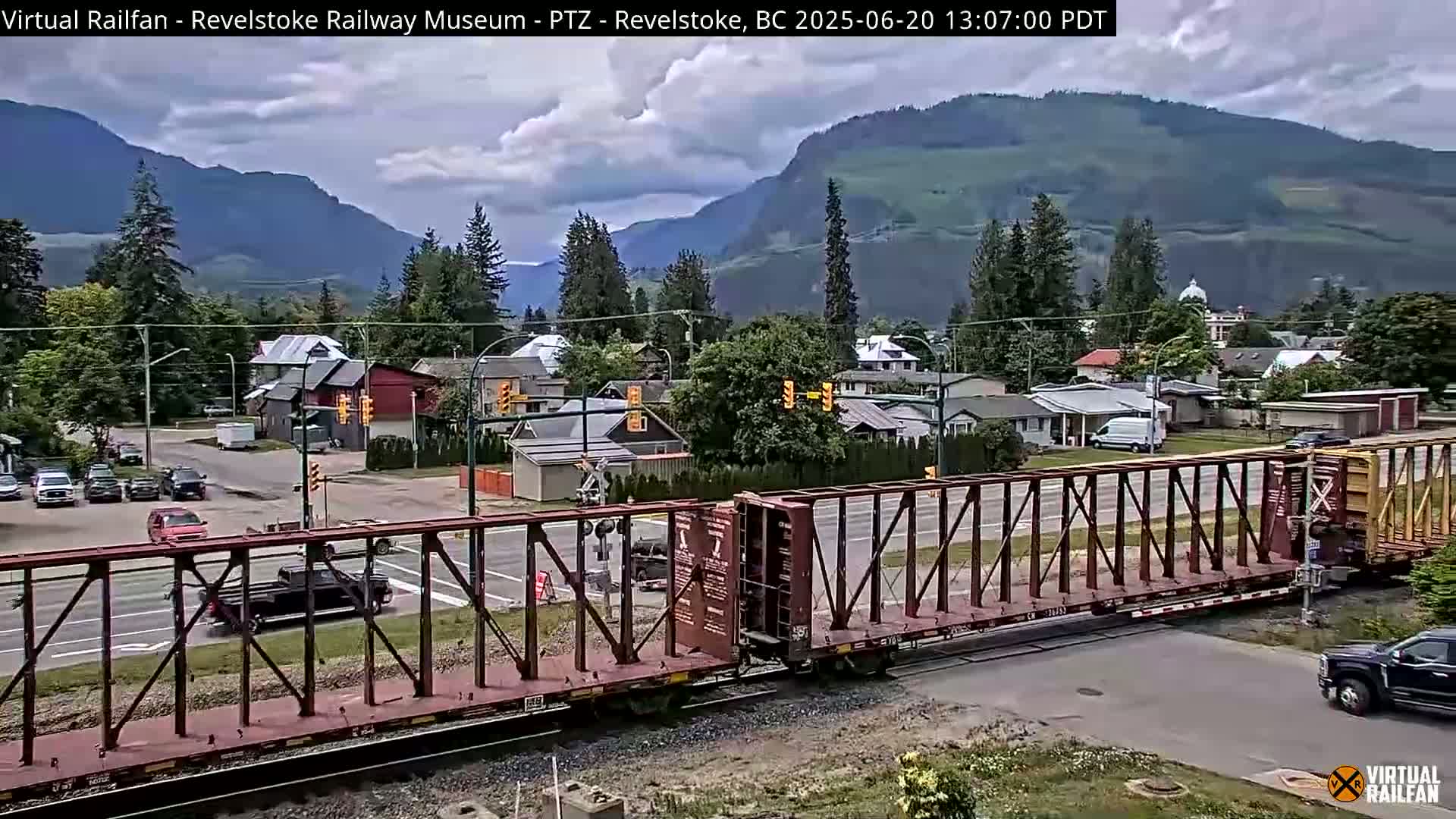 Revelstoke City & Canadian Pacific Railway Railroad Crossing Live Cam - Revelstoke, Columbia-Shuswap, British Columbia, Canada  PTZ | Virtual Railfan LIVE ! 2025-03-18 12:14