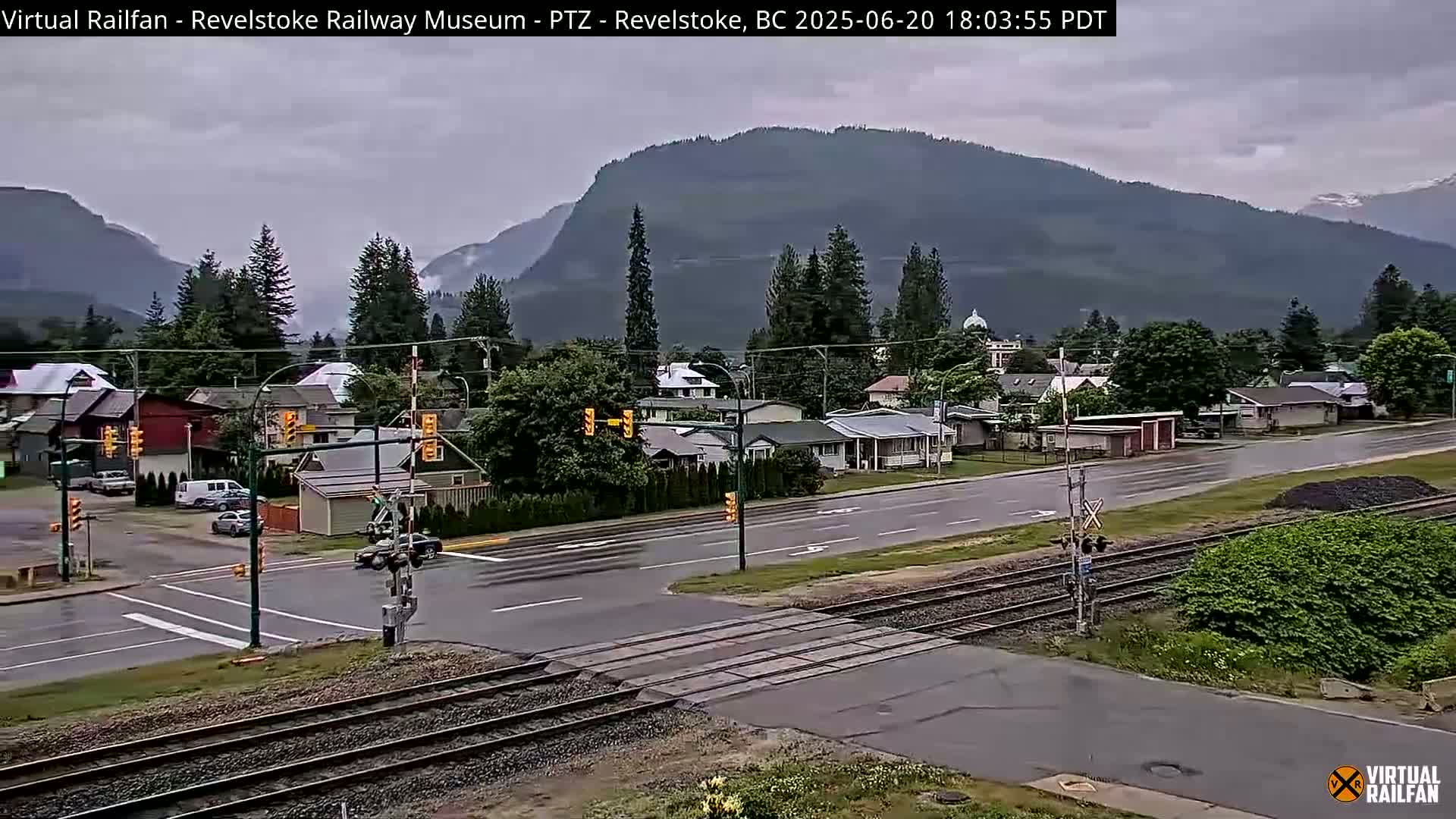 Revelstoke City & Canadian Pacific Railway Railroad Crossing Live Cam - Revelstoke, Columbia-Shuswap, British Columbia, Canada  PTZ | Virtual Railfan LIVE ! 2025-03-18 12:14