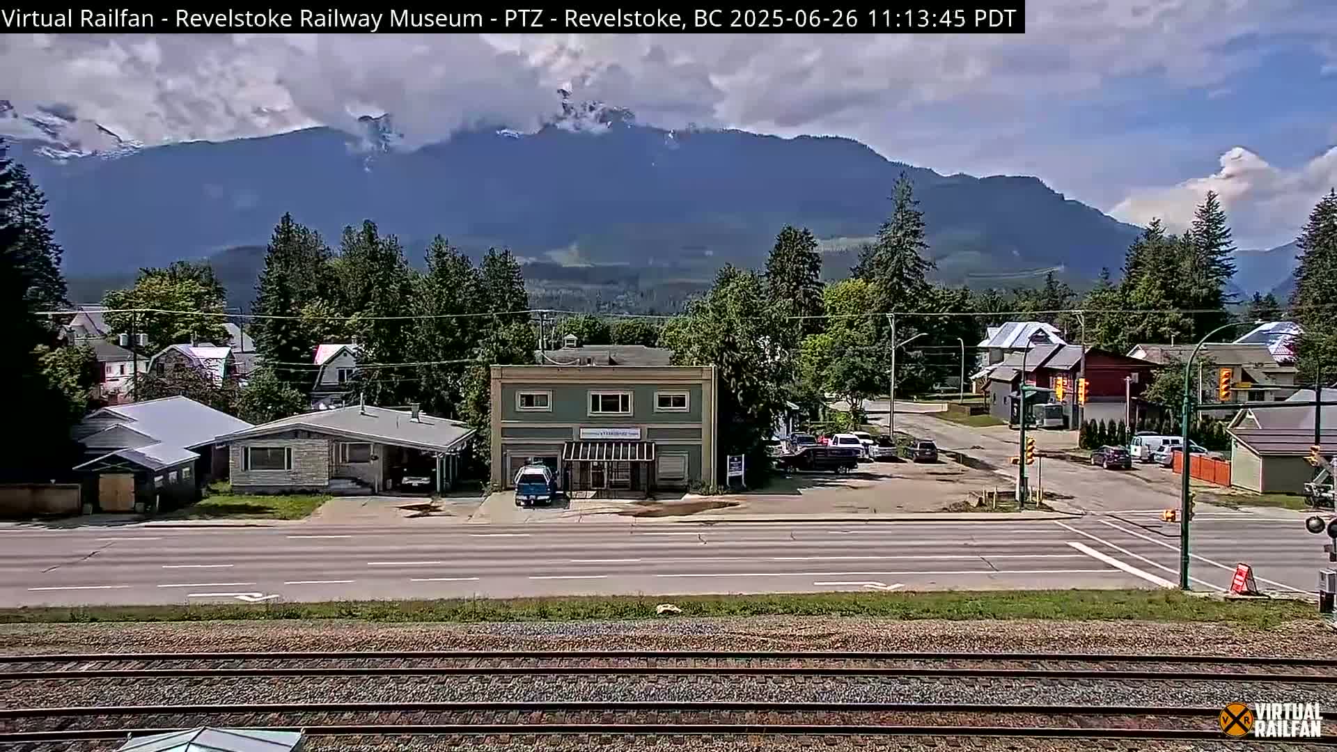 Revelstoke City & Canadian Pacific Railway Railroad Crossing Live Cam - Revelstoke, Columbia-Shuswap, British Columbia, Canada  PTZ | Virtual Railfan LIVE ! 2025-03-18 12:14