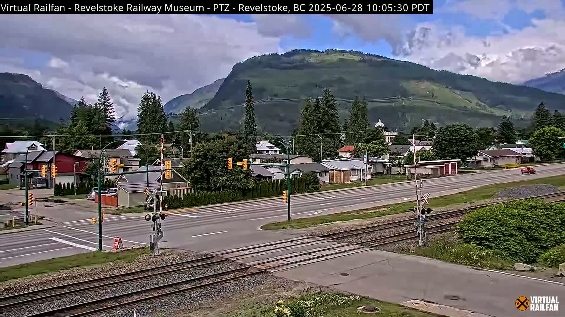 Revelstoke City & Canadian Pacific Railway Railroad Crossing Live Cam - Revelstoke, Columbia-Shuswap, British Columbia, Canada  PTZ | Virtual Railfan LIVE ! 2025-03-18 12:14