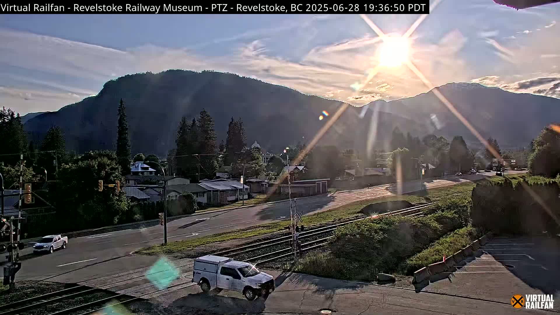 Revelstoke City & Canadian Pacific Railway Railroad Crossing Live Cam - Revelstoke, Columbia-Shuswap, British Columbia, Canada  PTZ | Virtual Railfan LIVE ! 2025-03-18 12:14
