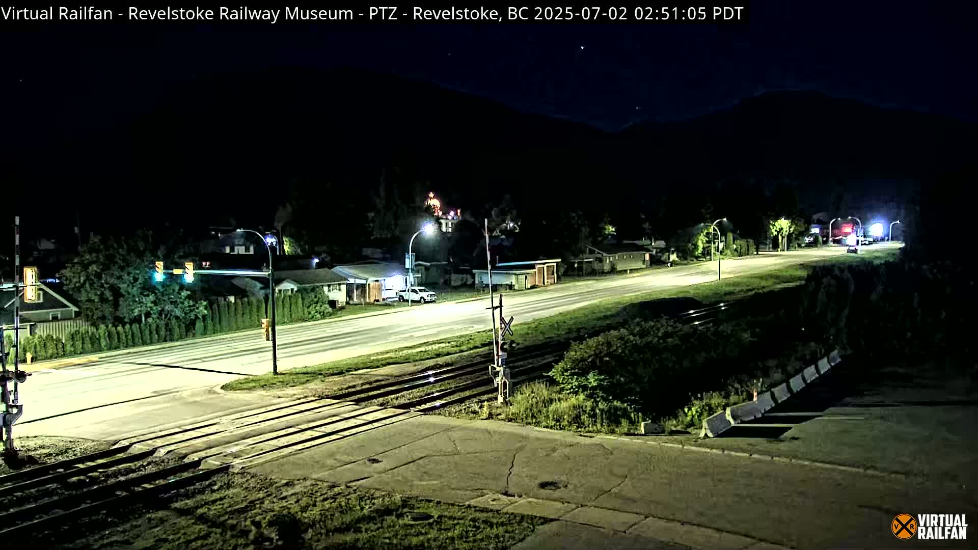 Revelstoke City & Canadian Pacific Railway Railroad Crossing Live Cam - Revelstoke, Columbia-Shuswap, British Columbia, Canada  PTZ | Virtual Railfan LIVE ! 2025-03-18 12:14