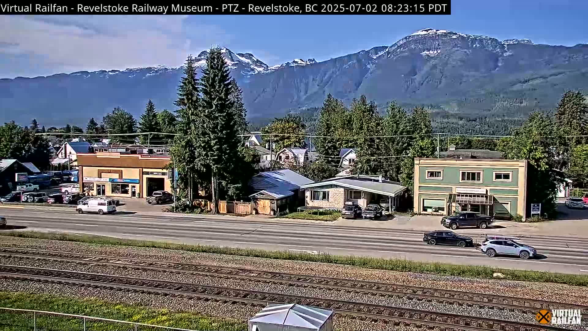 Revelstoke City & Canadian Pacific Railway Railroad Crossing Live Cam - Revelstoke, Columbia-Shuswap, British Columbia, Canada  PTZ | Virtual Railfan LIVE ! 2025-03-18 12:14