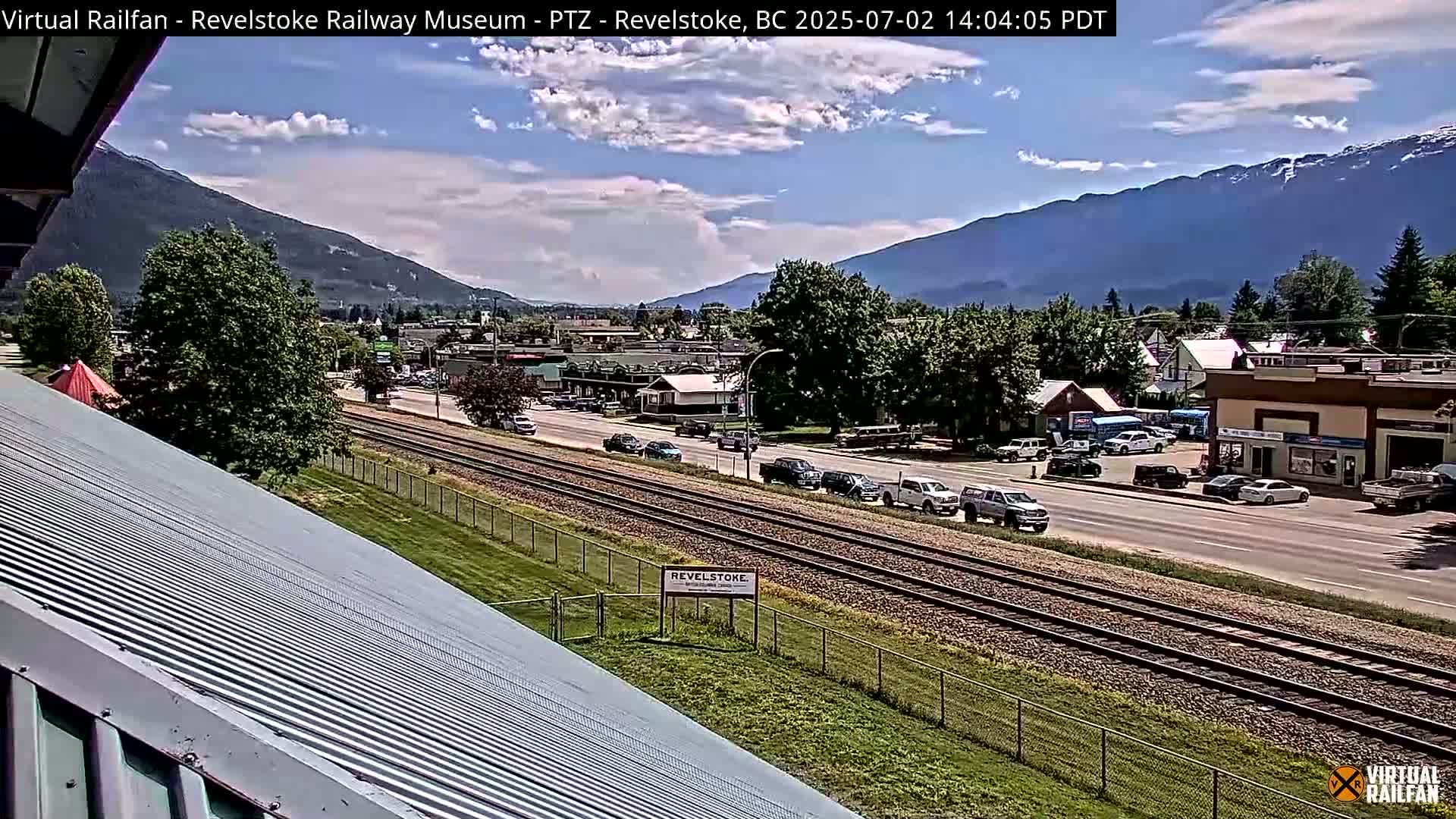 Revelstoke City & Canadian Pacific Railway Railroad Crossing Live Cam - Revelstoke, Columbia-Shuswap, British Columbia, Canada  PTZ | Virtual Railfan LIVE ! 2025-03-18 12:14