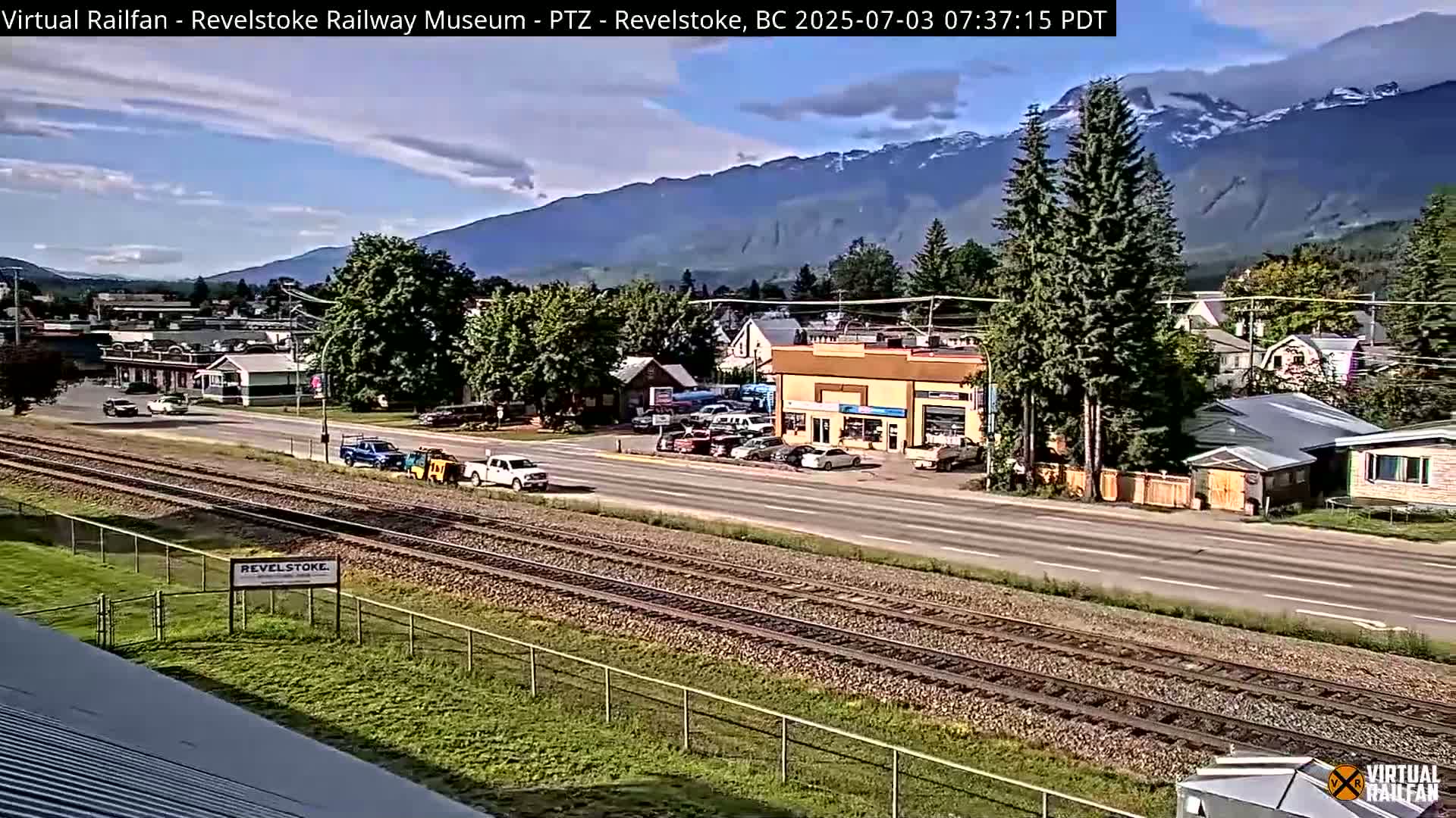 Revelstoke City & Canadian Pacific Railway Railroad Crossing Live Cam - Revelstoke, Columbia-Shuswap, British Columbia, Canada  PTZ | Virtual Railfan LIVE ! 2025-03-18 12:14