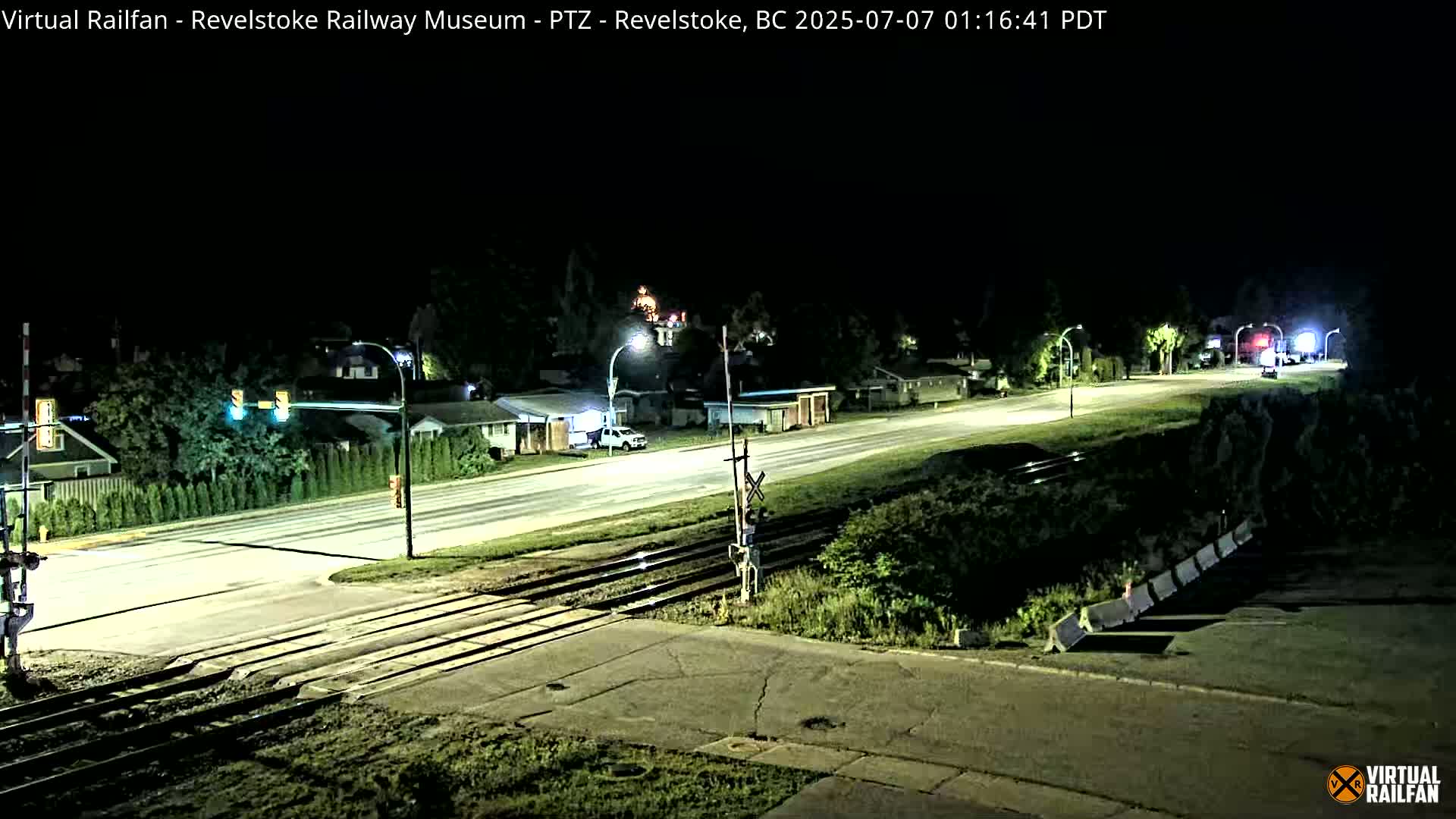 Revelstoke City & Canadian Pacific Railway Railroad Crossing Live Cam - Revelstoke, Columbia-Shuswap, British Columbia, Canada  PTZ | Virtual Railfan LIVE ! 2025-03-18 12:14