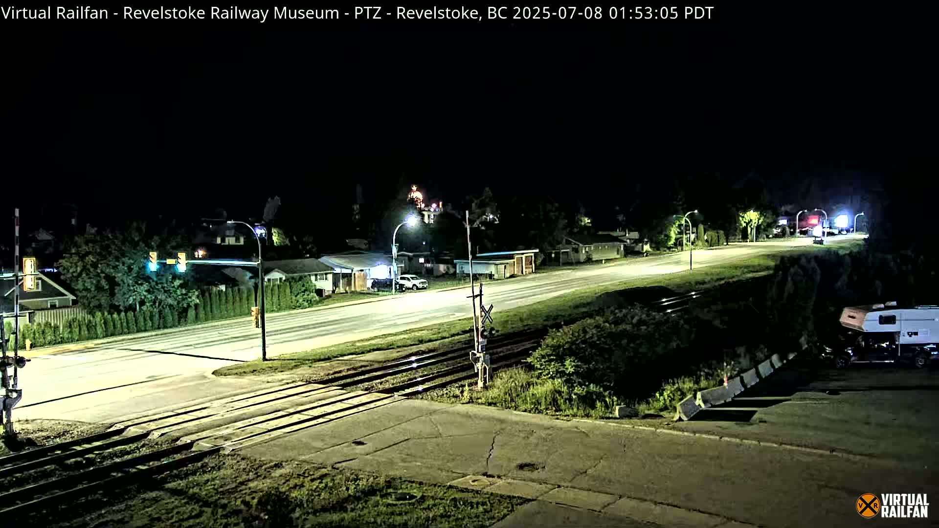 Revelstoke City & Canadian Pacific Railway Railroad Crossing Live Cam - Revelstoke, Columbia-Shuswap, British Columbia, Canada  PTZ | Virtual Railfan LIVE ! 2025-03-18 12:14