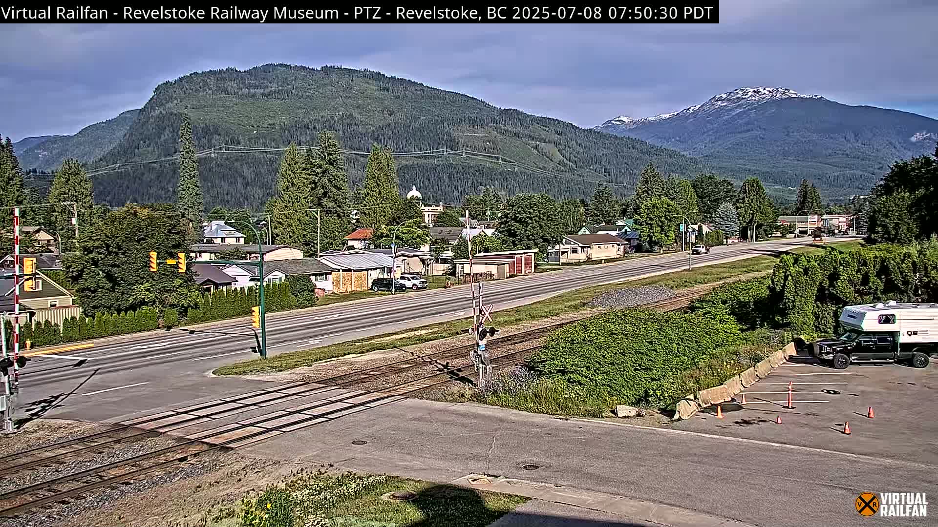 Revelstoke City & Canadian Pacific Railway Railroad Crossing Live Cam - Revelstoke, Columbia-Shuswap, British Columbia, Canada  PTZ | Virtual Railfan LIVE ! 2025-03-18 12:14