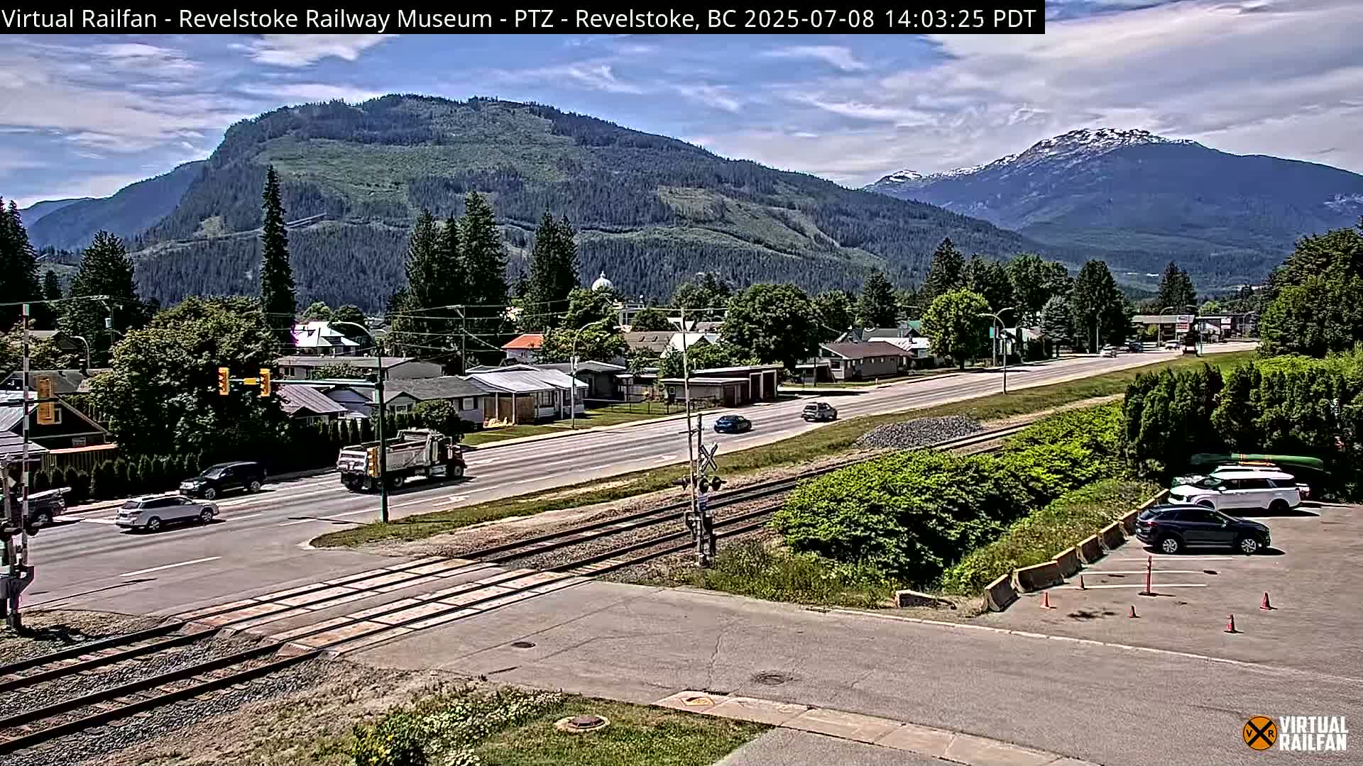 Revelstoke City & Canadian Pacific Railway Railroad Crossing Live Cam - Revelstoke, Columbia-Shuswap, British Columbia, Canada  PTZ | Virtual Railfan LIVE ! 2025-03-18 12:14