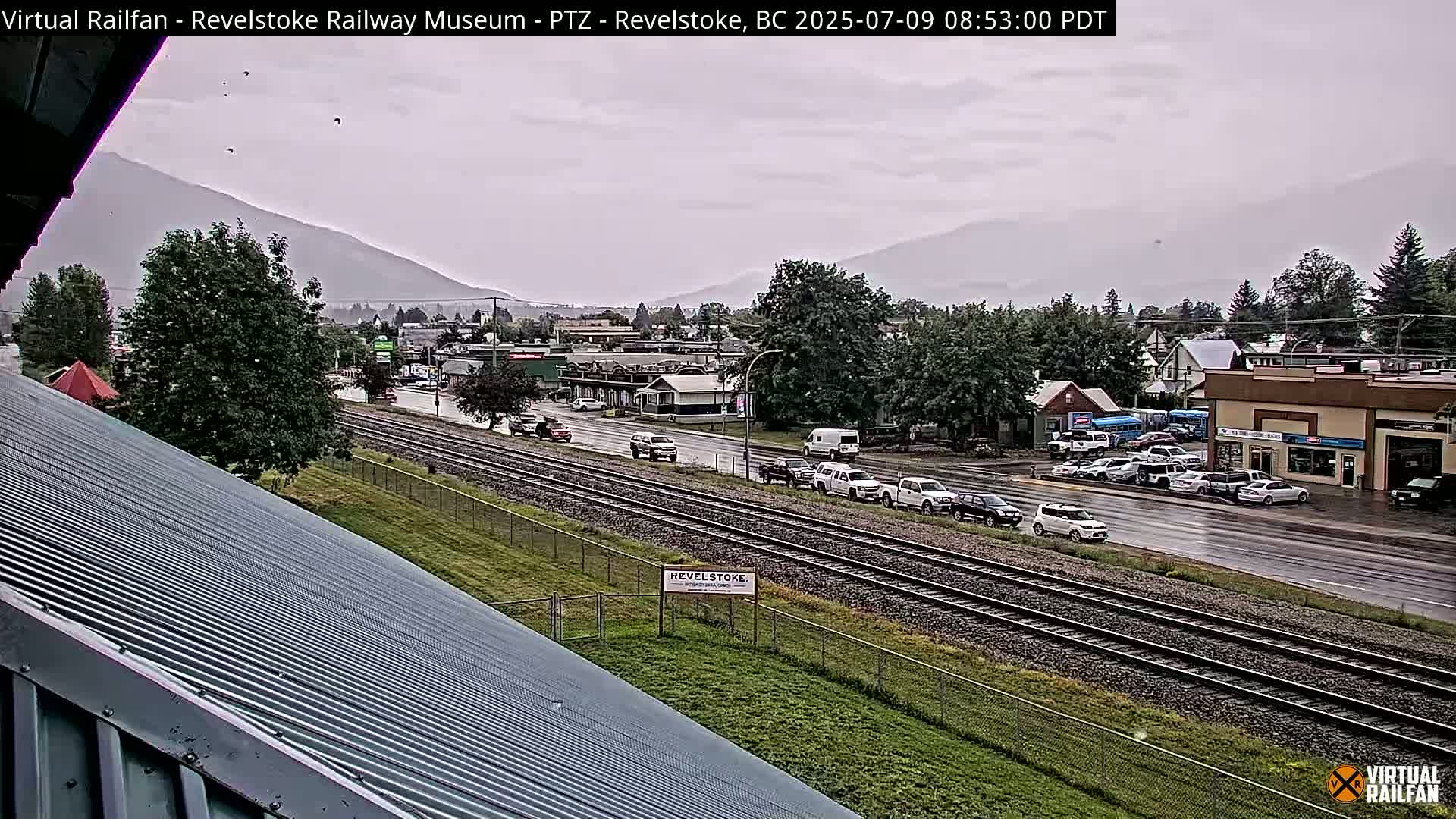 Revelstoke City & Canadian Pacific Railway Railroad Crossing Live Cam - Revelstoke, Columbia-Shuswap, British Columbia, Canada  PTZ | Virtual Railfan LIVE ! 2025-03-18 12:14