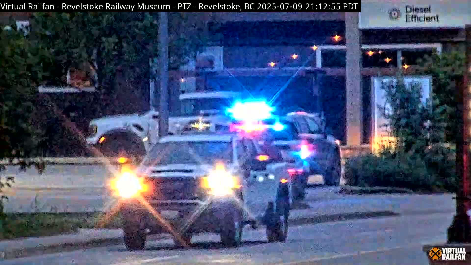 Revelstoke City & Canadian Pacific Railway Railroad Crossing Live Cam - Revelstoke, Columbia-Shuswap, British Columbia, Canada  PTZ | Virtual Railfan LIVE ! 2025-03-18 12:14