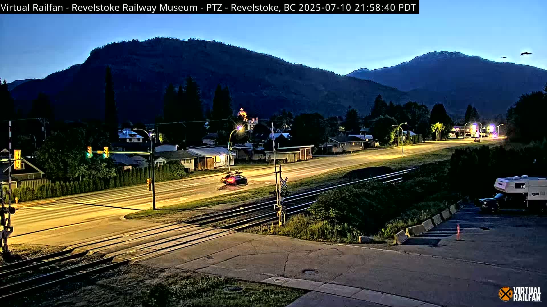 Revelstoke City & Canadian Pacific Railway Railroad Crossing Live Cam - Revelstoke, Columbia-Shuswap, British Columbia, Canada  PTZ | Virtual Railfan LIVE ! 2025-03-18 12:14