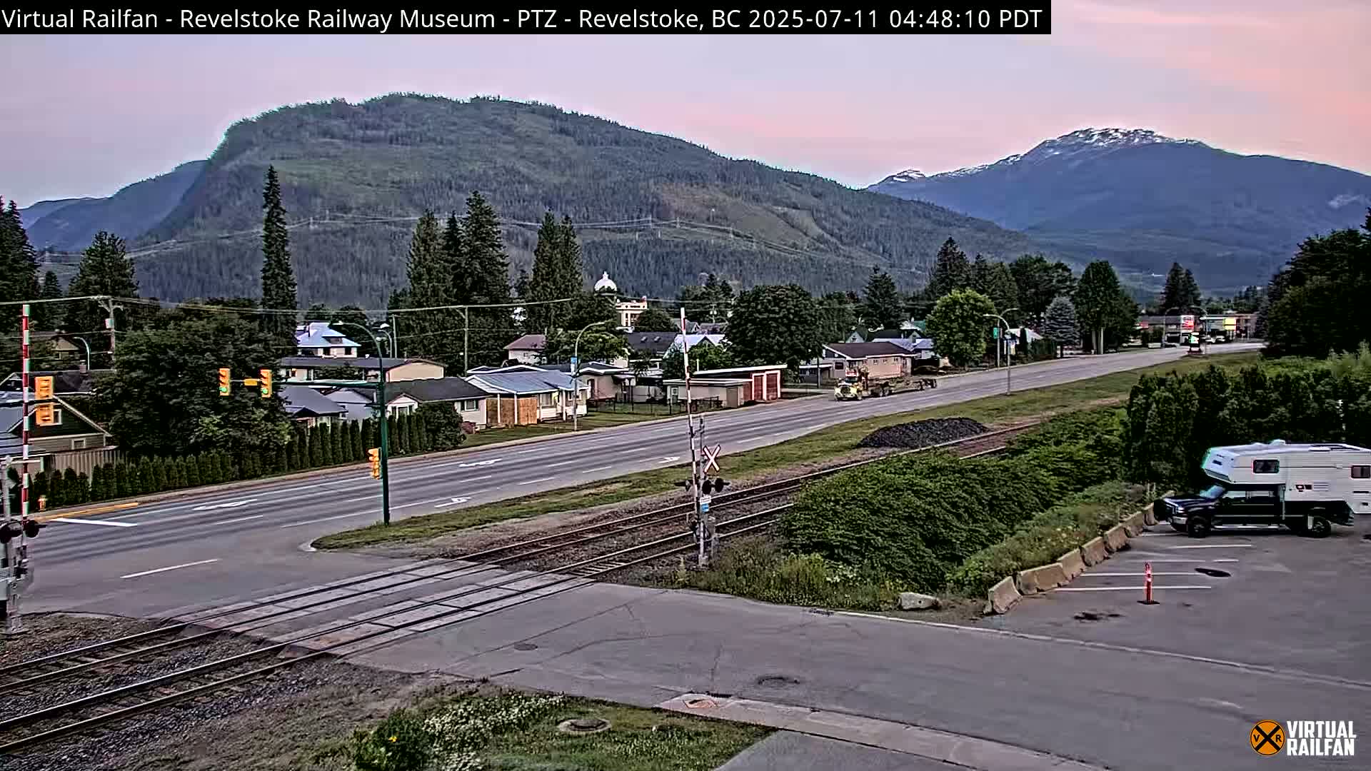 Revelstoke City & Canadian Pacific Railway Railroad Crossing Live Cam - Revelstoke, Columbia-Shuswap, British Columbia, Canada  PTZ | Virtual Railfan LIVE ! 2025-03-18 12:14